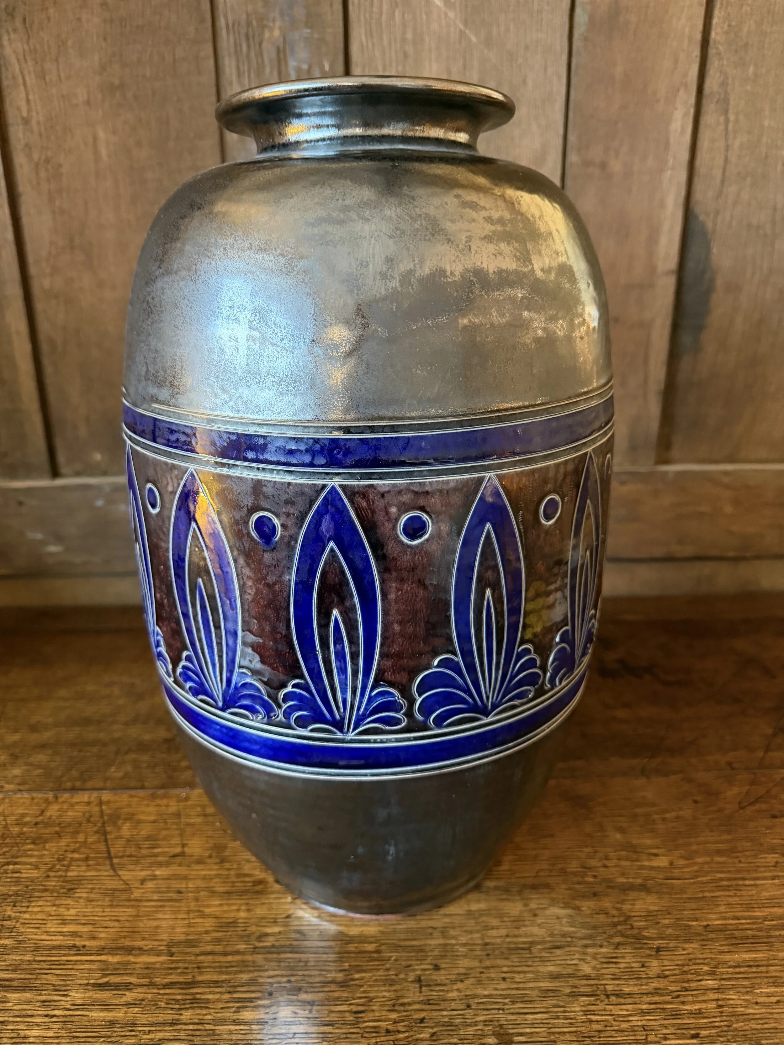 This is a picture of a very decorative early 20th century Secession glazed stoneware vase.