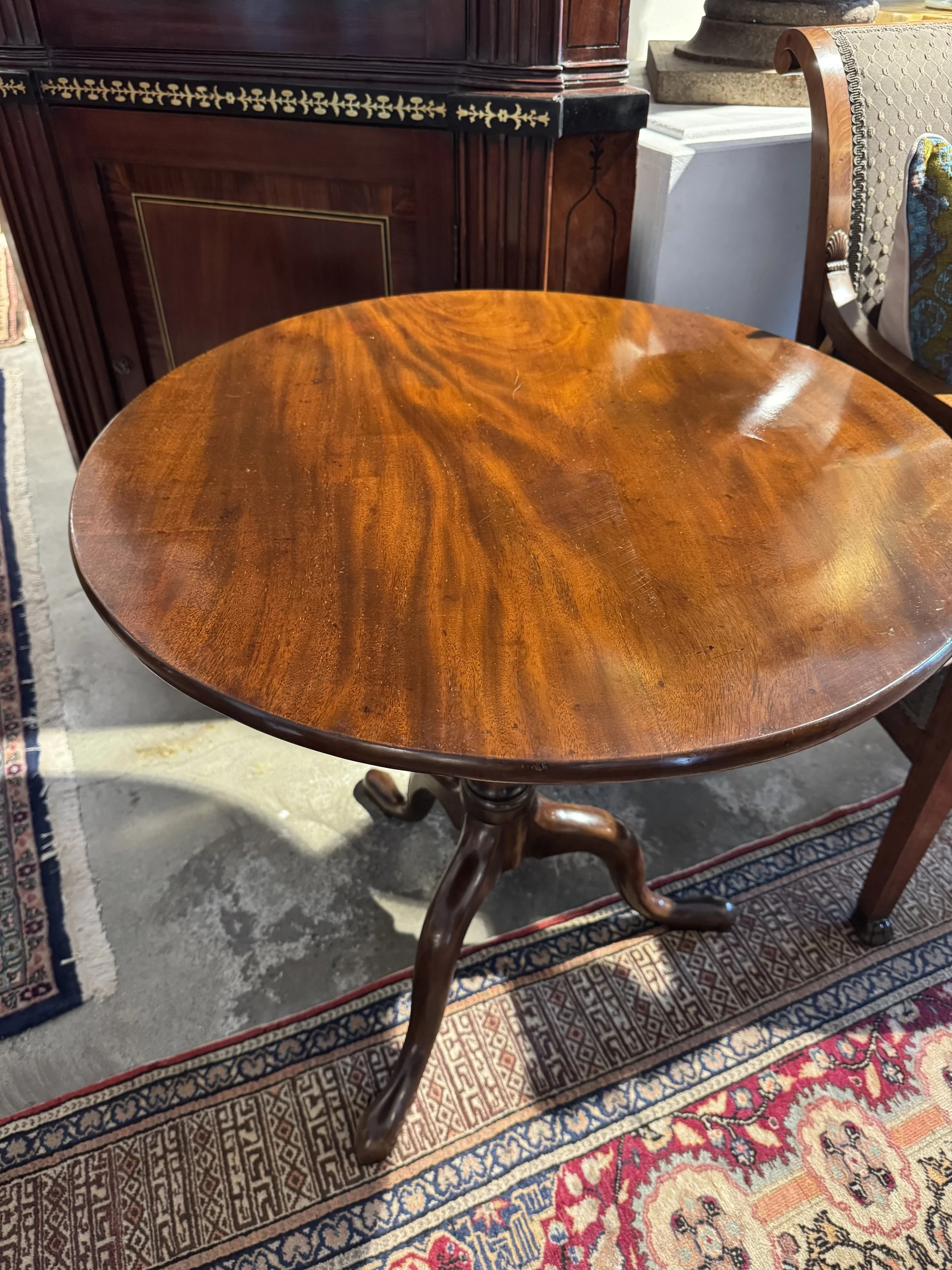 This is a picture of a very elegant George III period mahogany tilt top wine table c1780.
