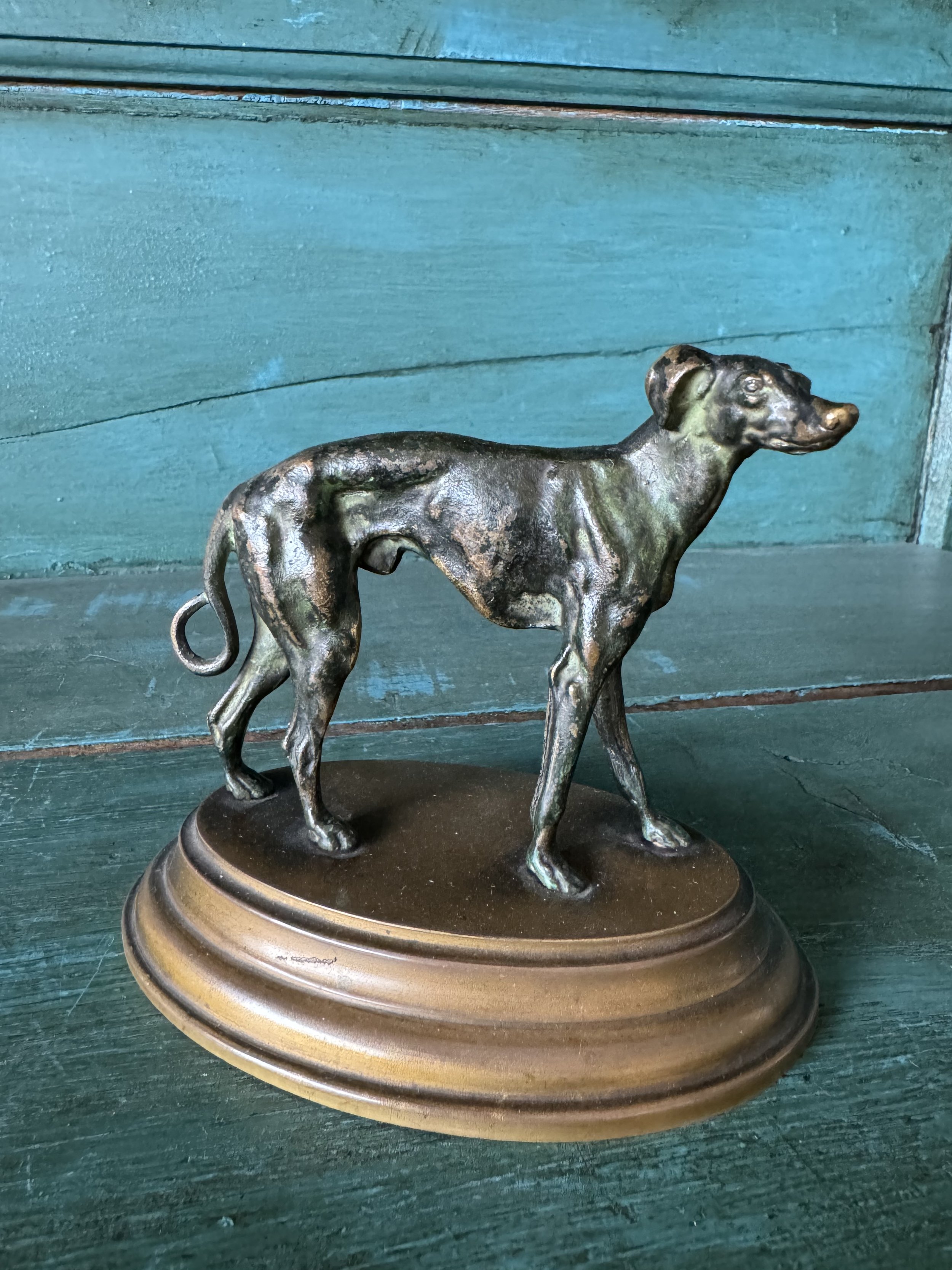 This is a picture of a very lovely antique French bronze animalier figure of a dog c1900.