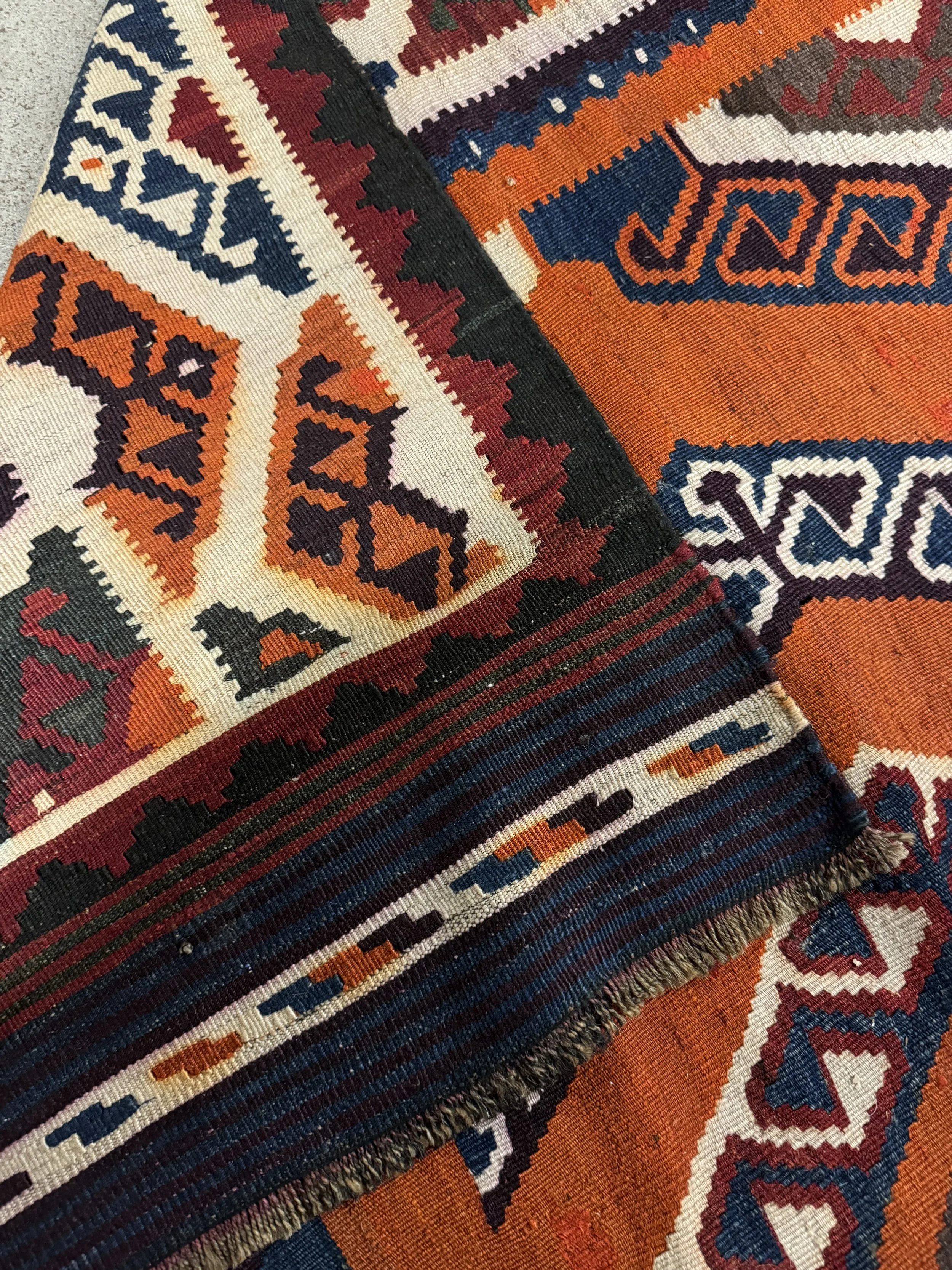 This is a picture of a hand woven wool on wool antique kilim from Shiraz c1900.