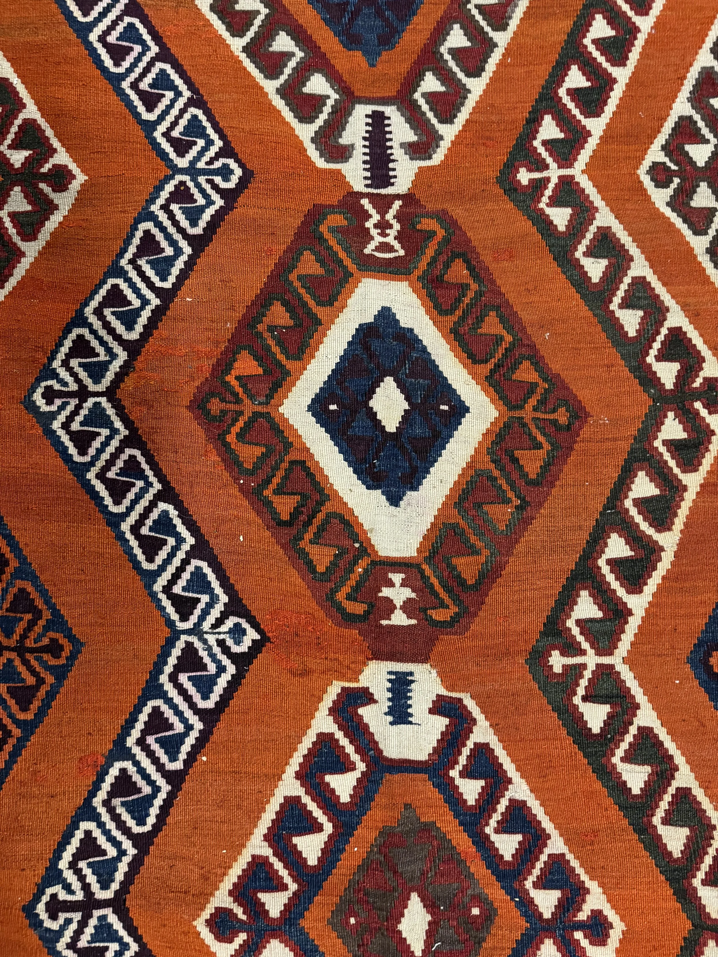 This is a picture of a hand woven wool on wool antique kilim from Shiraz c1900.