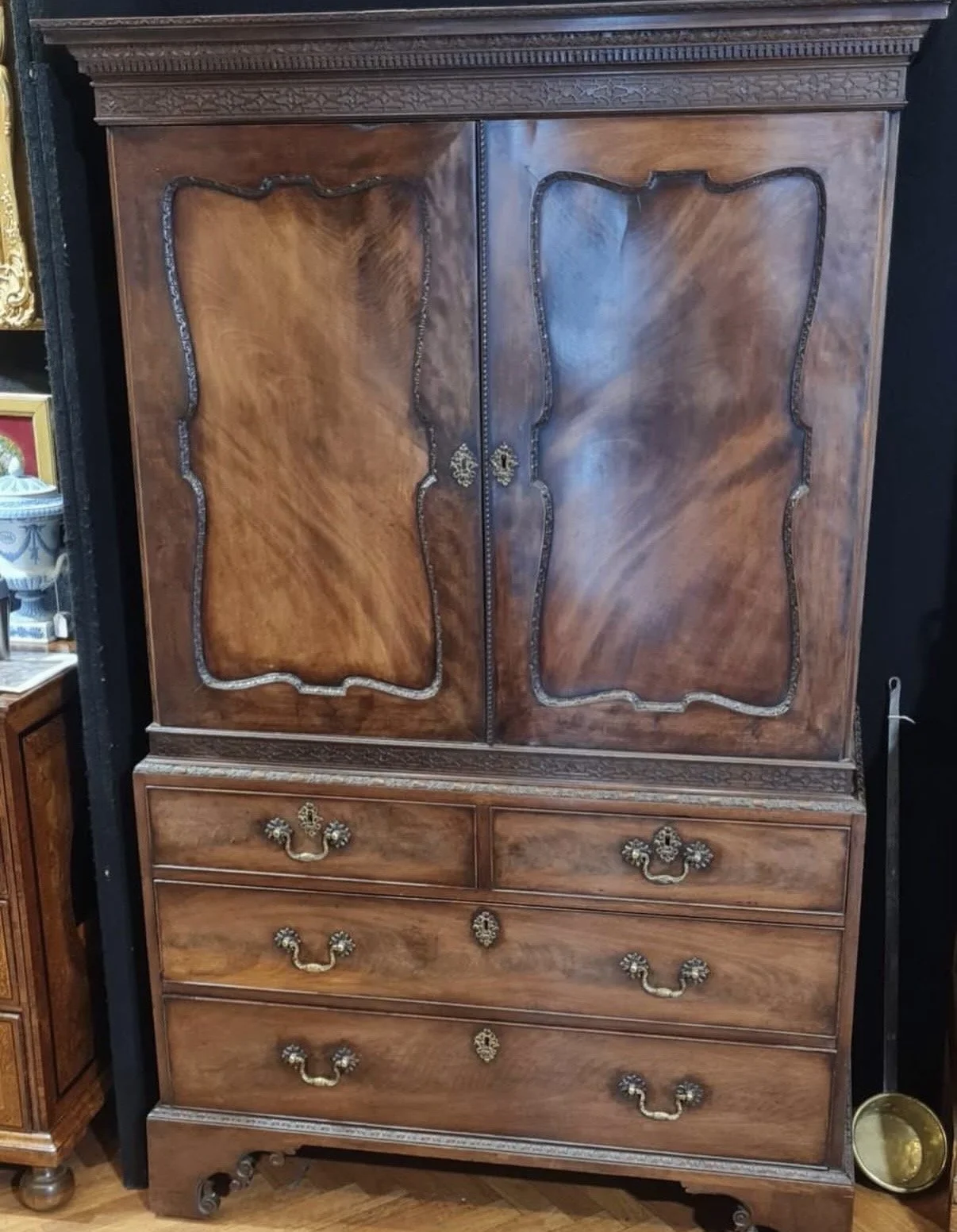 This is a picture of a very handsome George II period Cuban mahogany dwarf wardrobe with its original metalware in the manner of Giles Grendey c1750.
