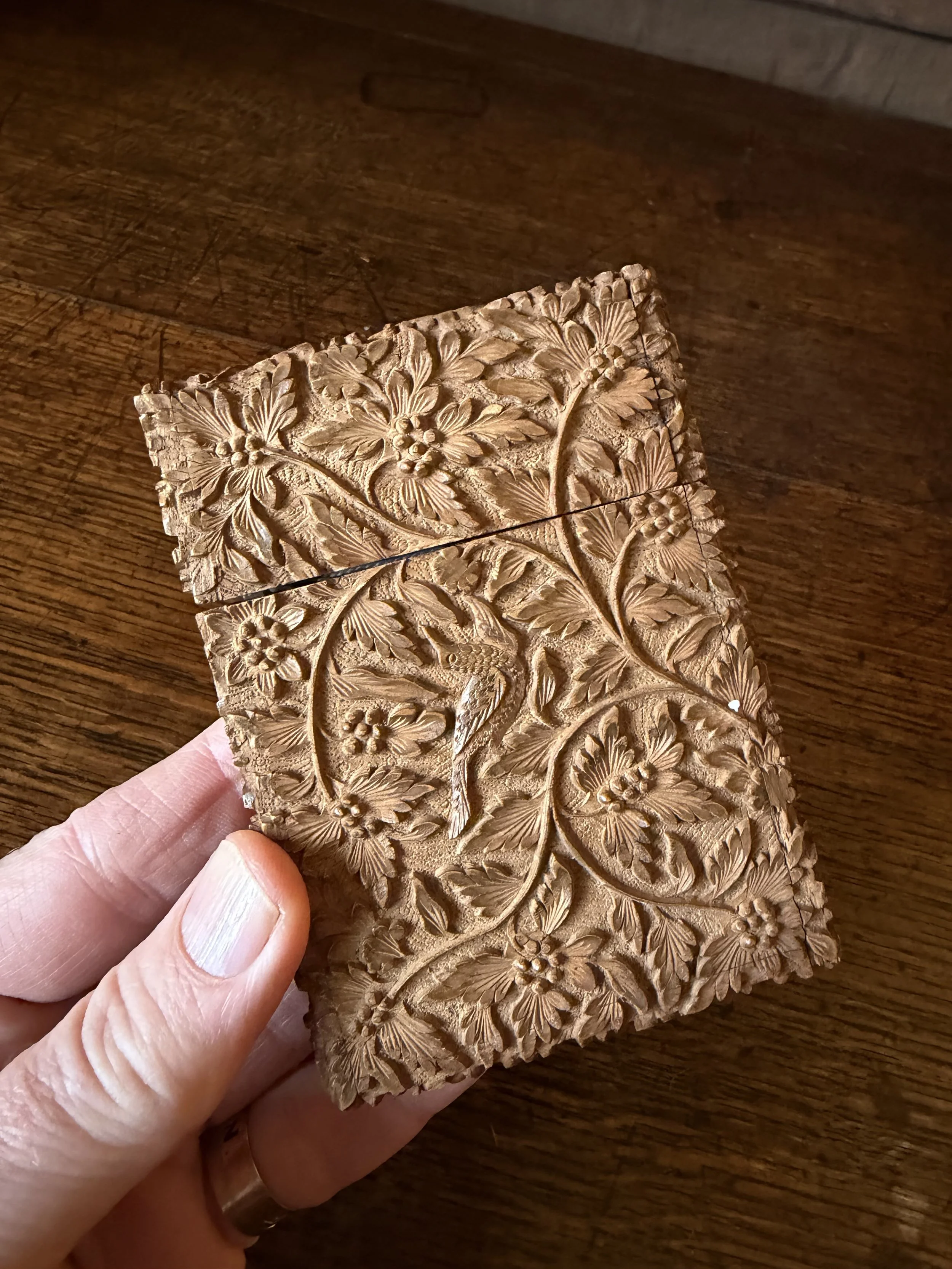 This is a picture of a fabulous late 19th century finely carved Anglo Indian wooden card case.