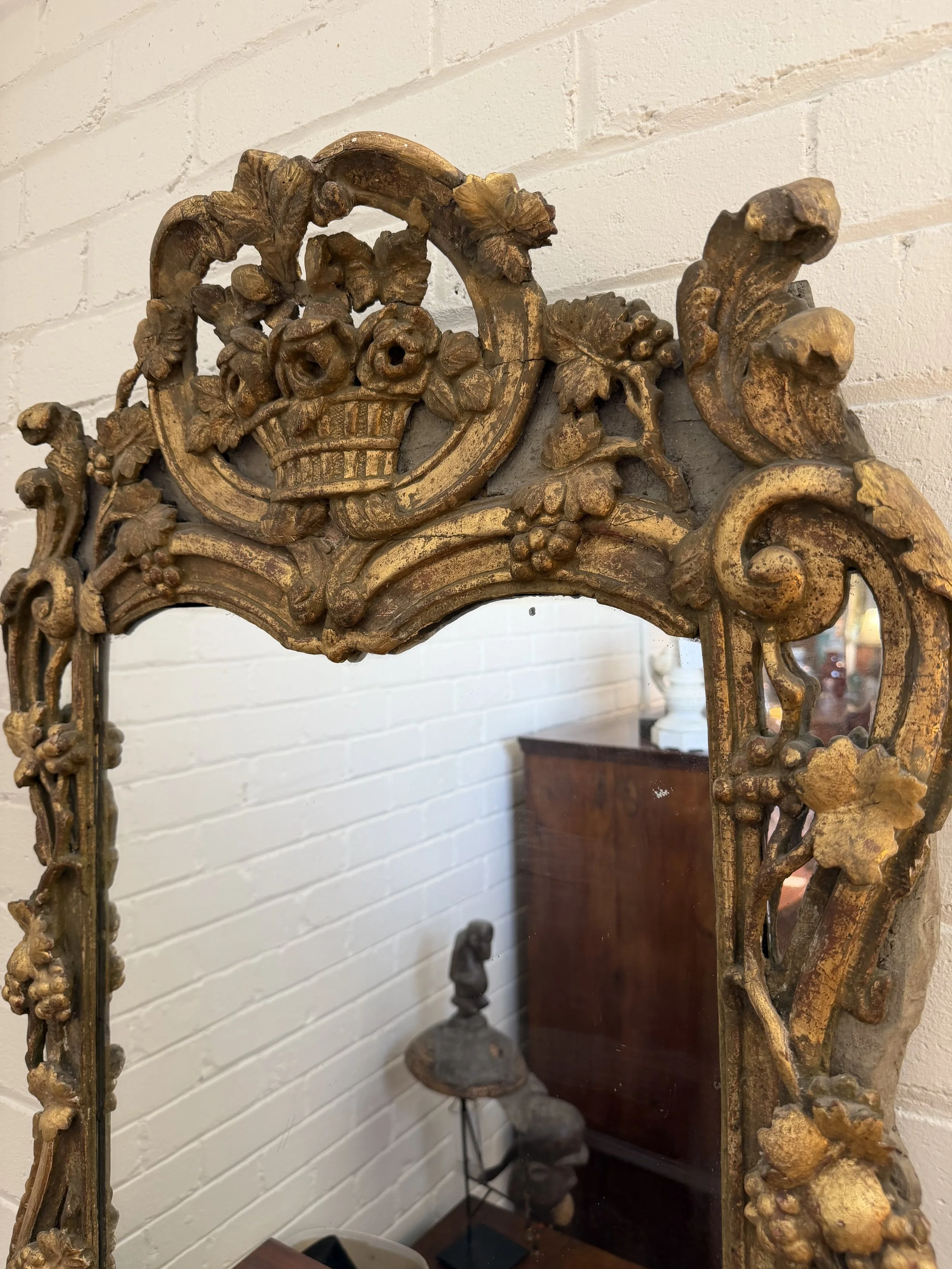 This is a picture of a very beautiful French Louis XV period carved and gilt wood mirror c1750.