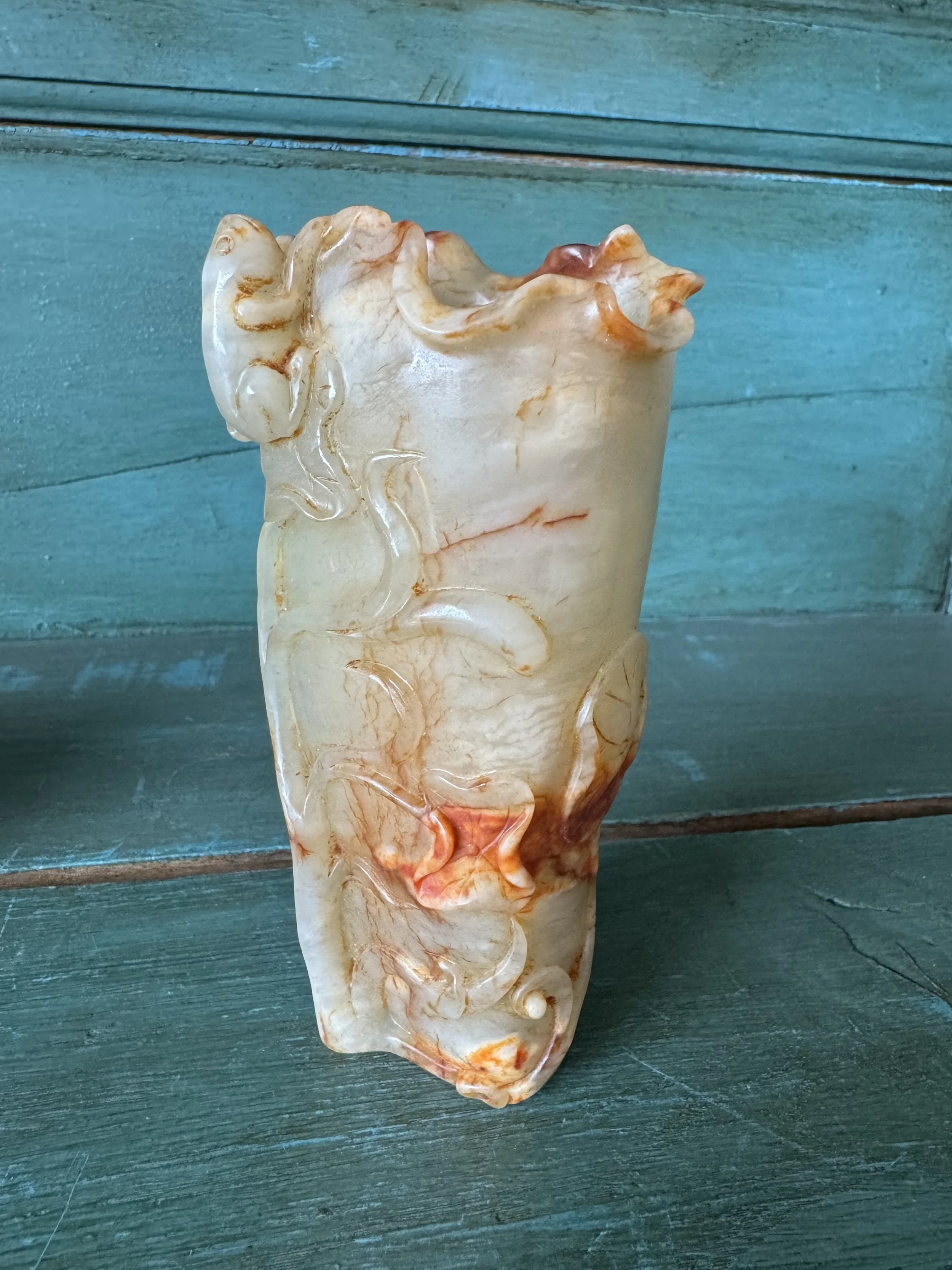 This is a picture of a very beautiful and finely carved antique 19th century Chinese jade brush washer.