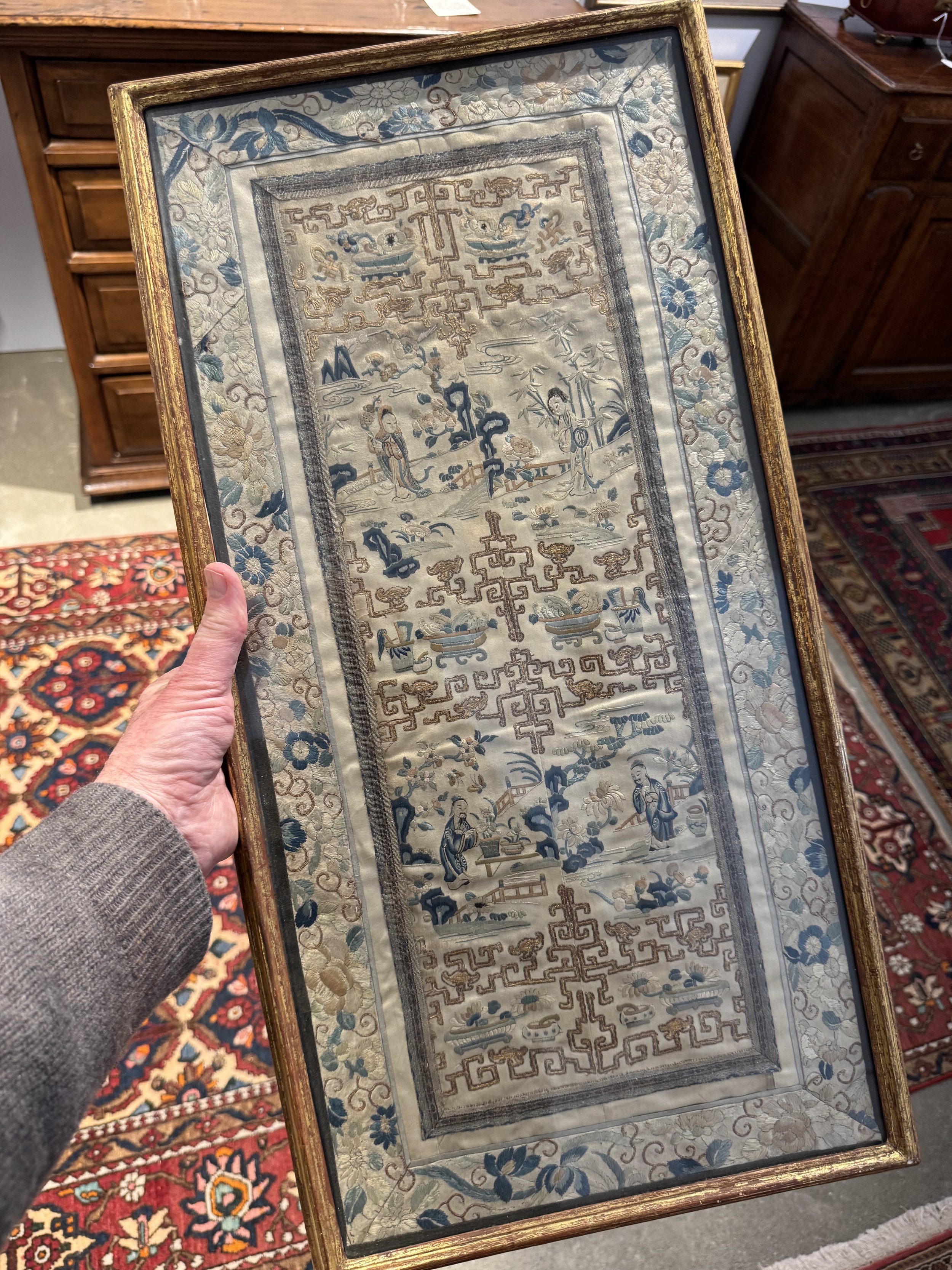 This is a picture of an antique framed panel of 19th century Chinese silk embroidery.
