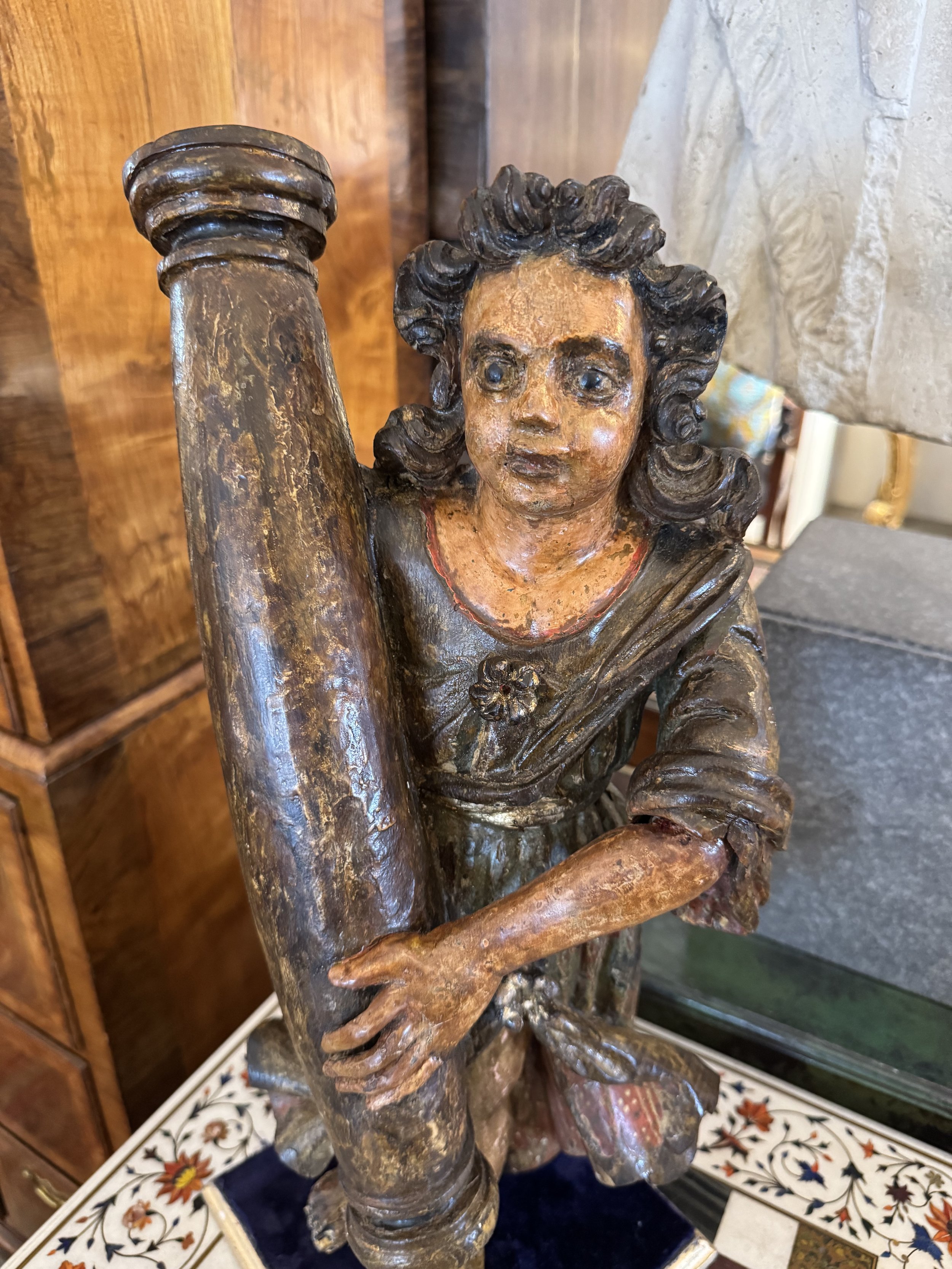 This is a picture of a wonderful 18th century carved and polychrome wood figure of Saint Simeon Stylites.