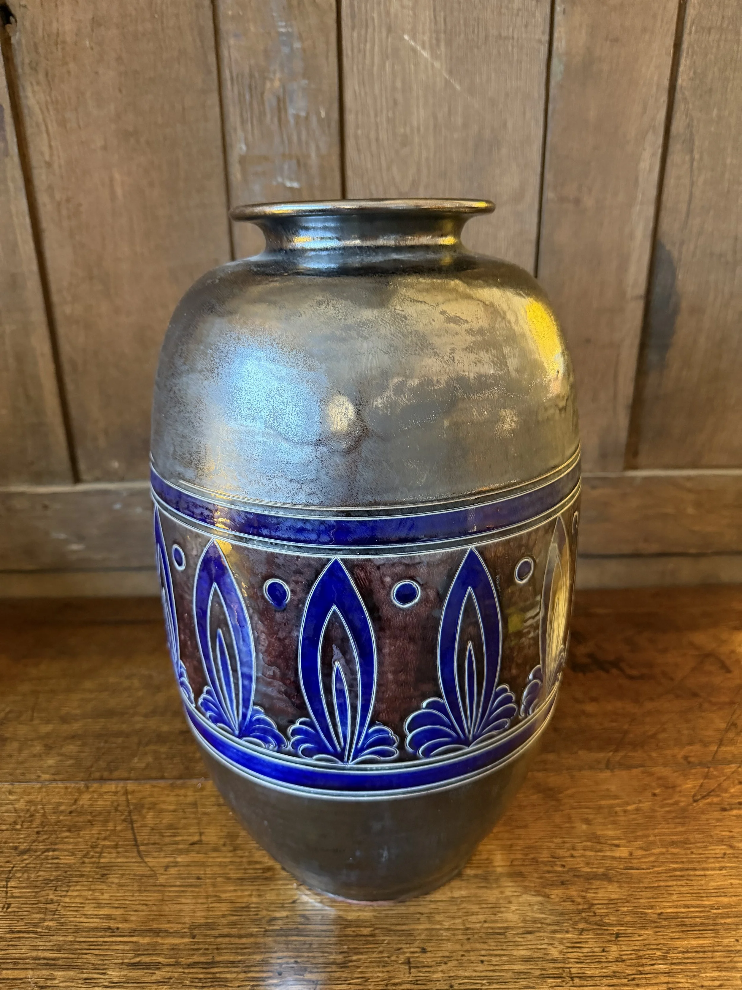 This is a picture of a very decorative early 20th century Secession glazed stoneware vase.
