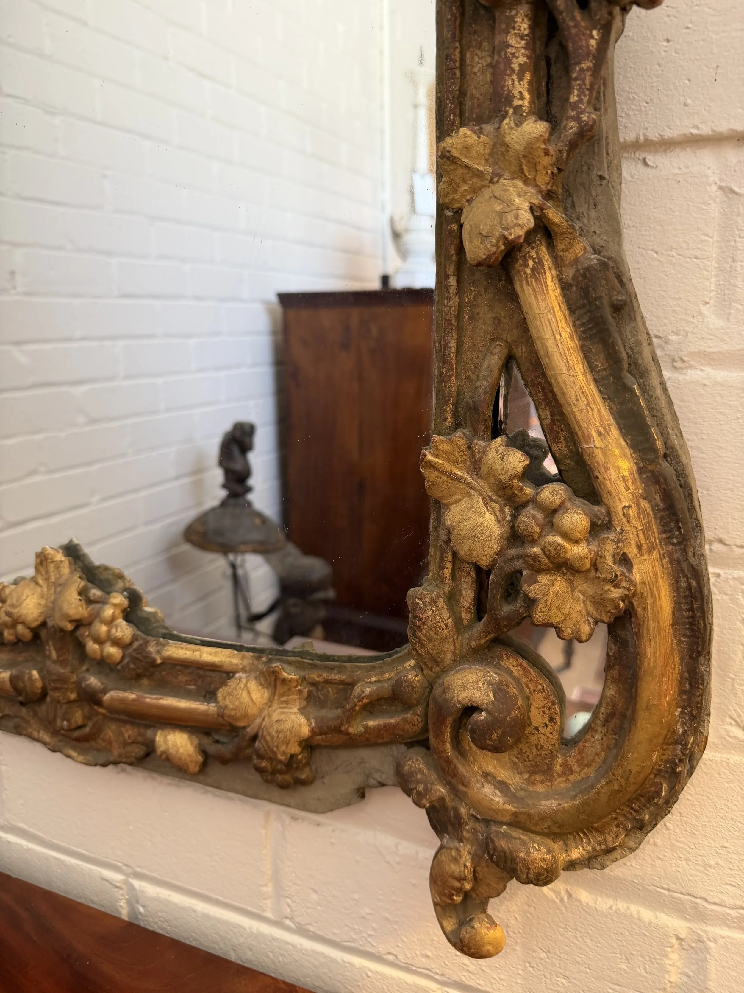 This is a picture of a very beautiful French Louis XV period carved and gilt wood mirror c1750.