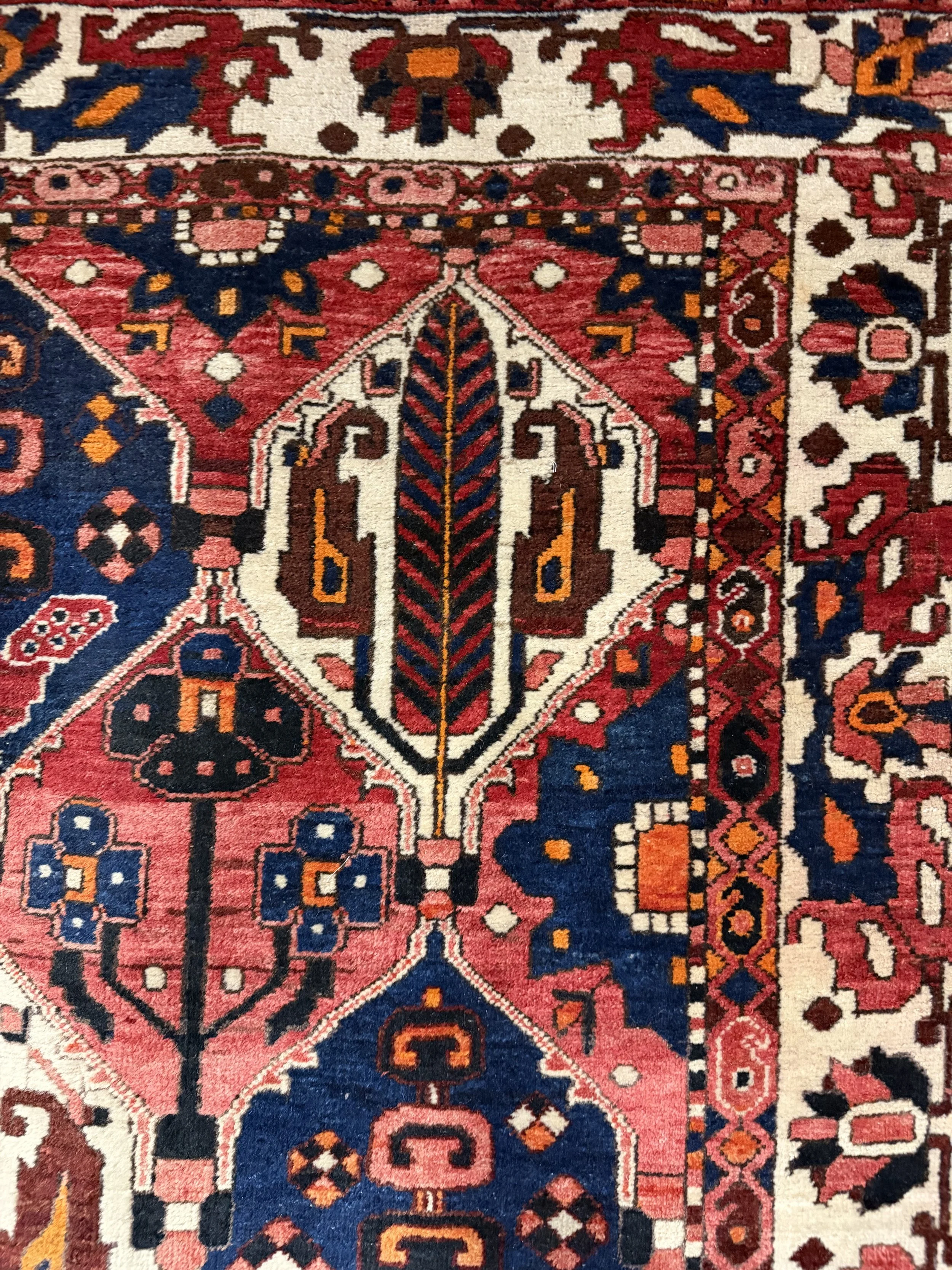 This is a picture of a very beautiful hand knotted wool on cotton Persian Bakhtiari rug c1970.