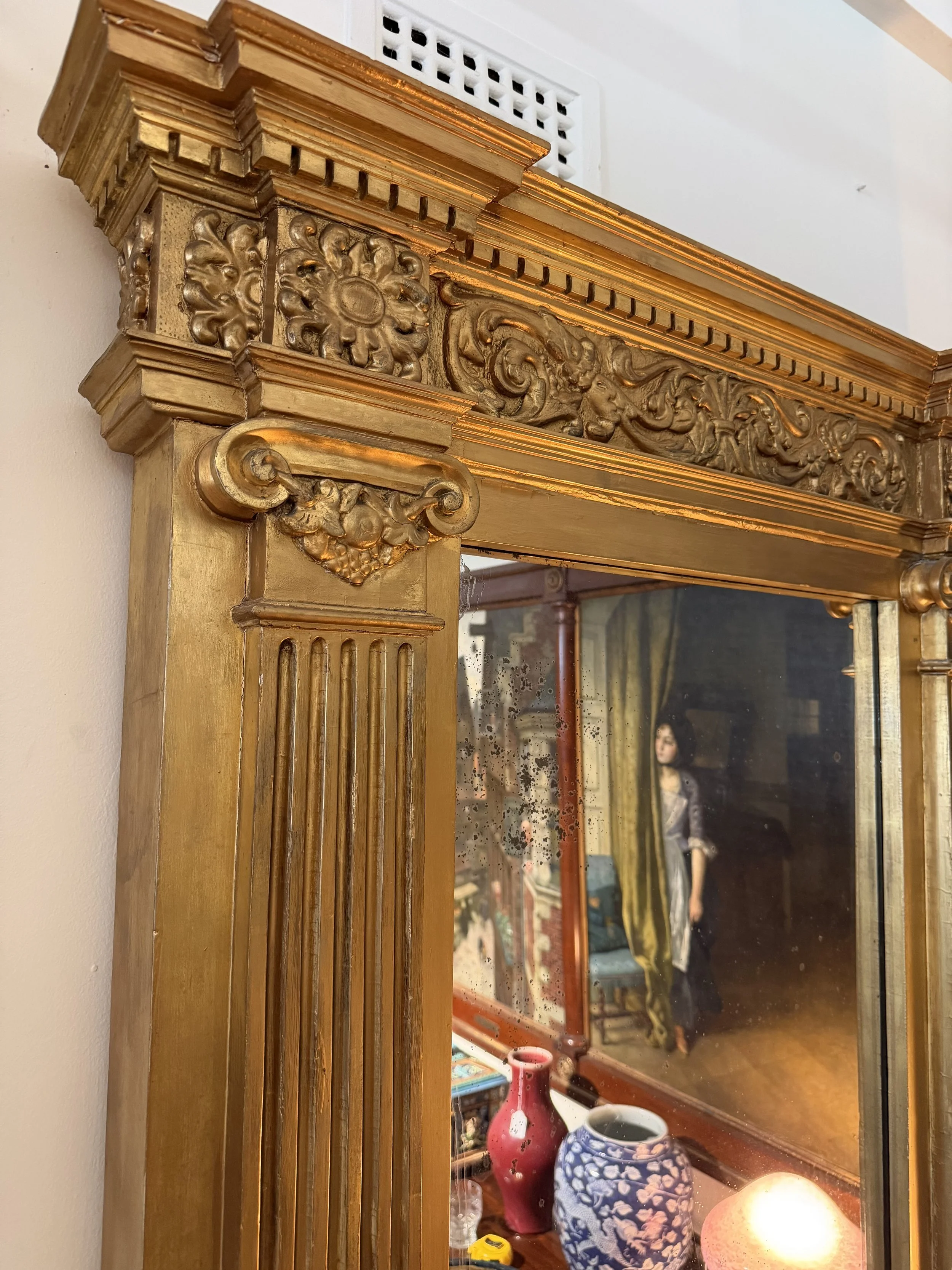 This is a picture of a very architectural early 19th century Florentine gilt wood tabernacle mirror c1800.