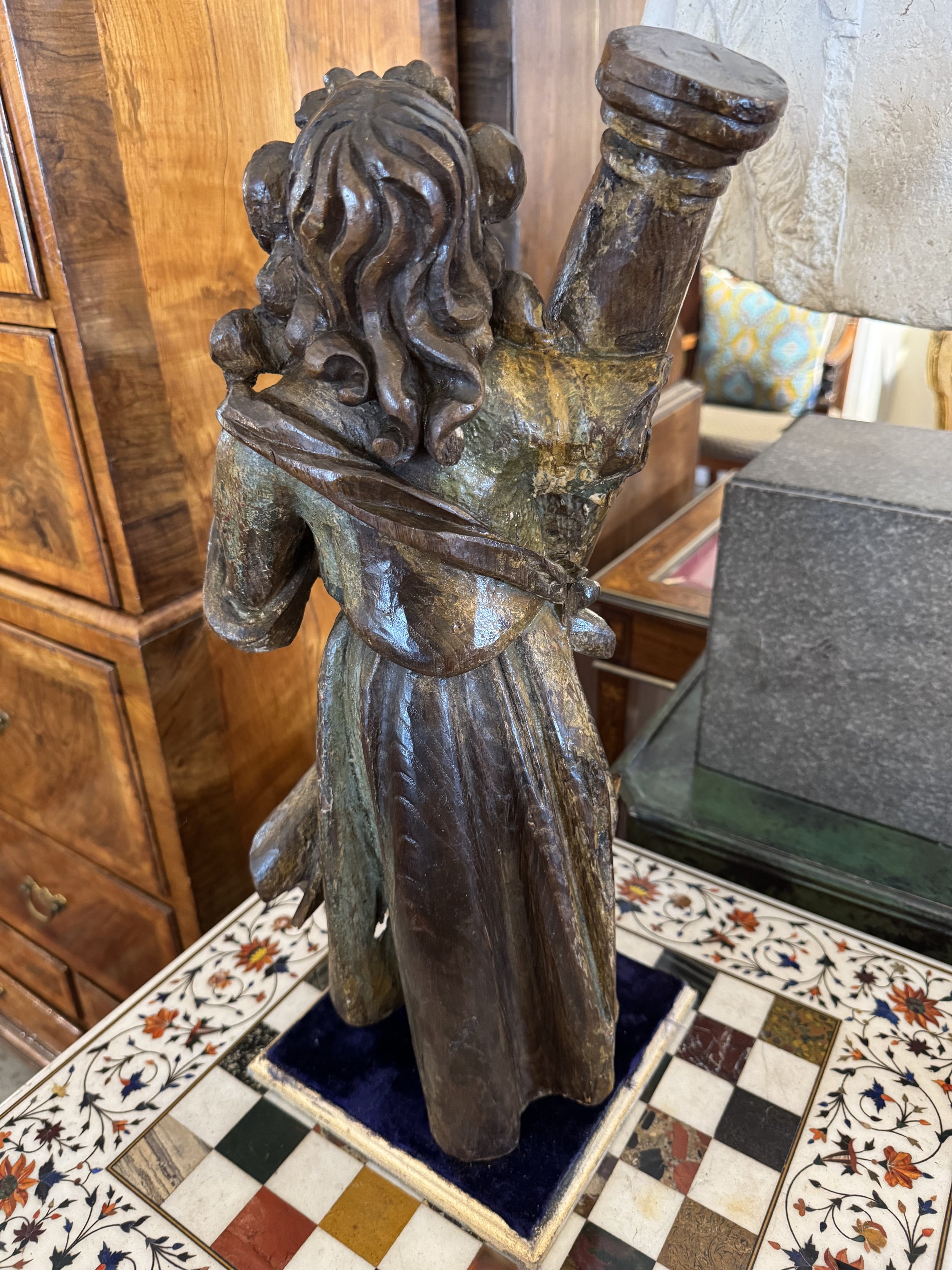 This is a picture of a wonderful 18th century carved and polychrome wood figure of Saint Simeon Stylites.