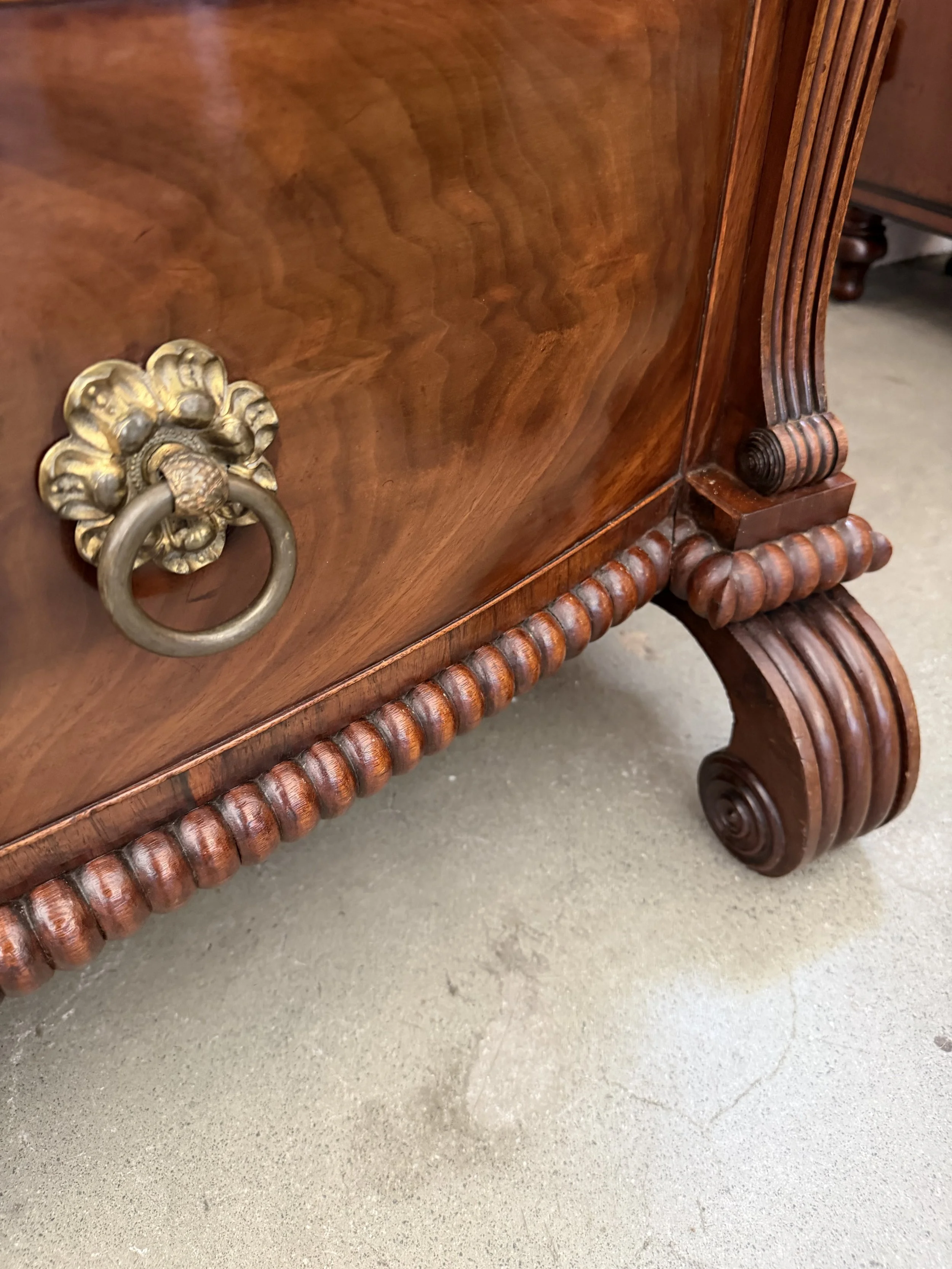 This is a picture of a superb George IV period mahogany bow front chest of drawers retaining it’s original brass ring handles, Channel Islands origin, c1825.