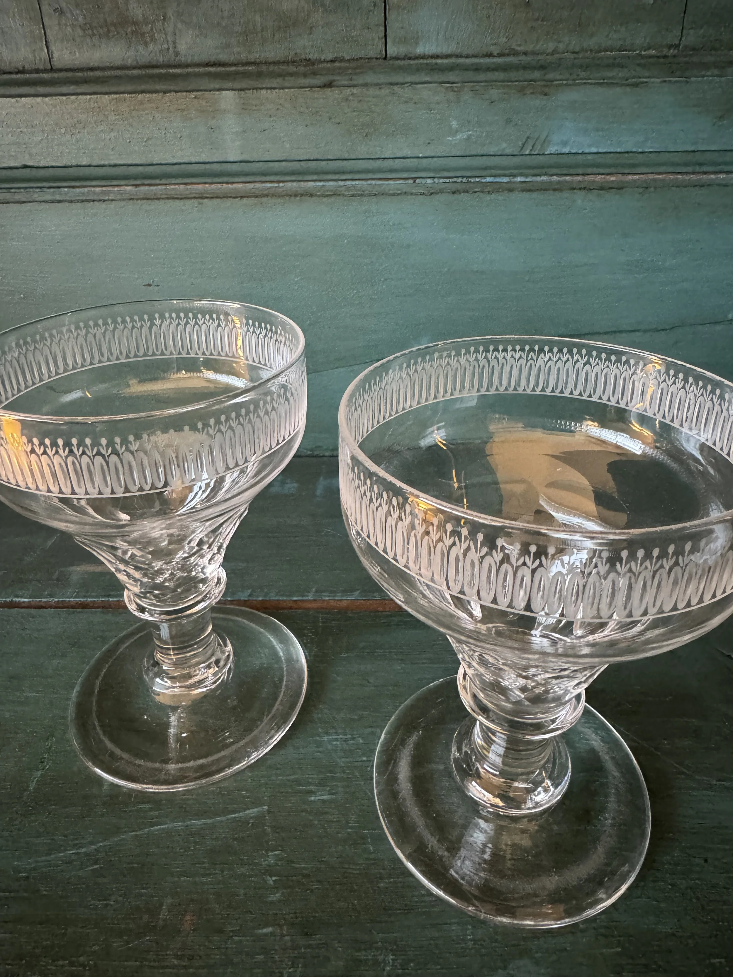 This is a picture of a very lovely pair of cut and engraved ovoid glass rummers c1830.