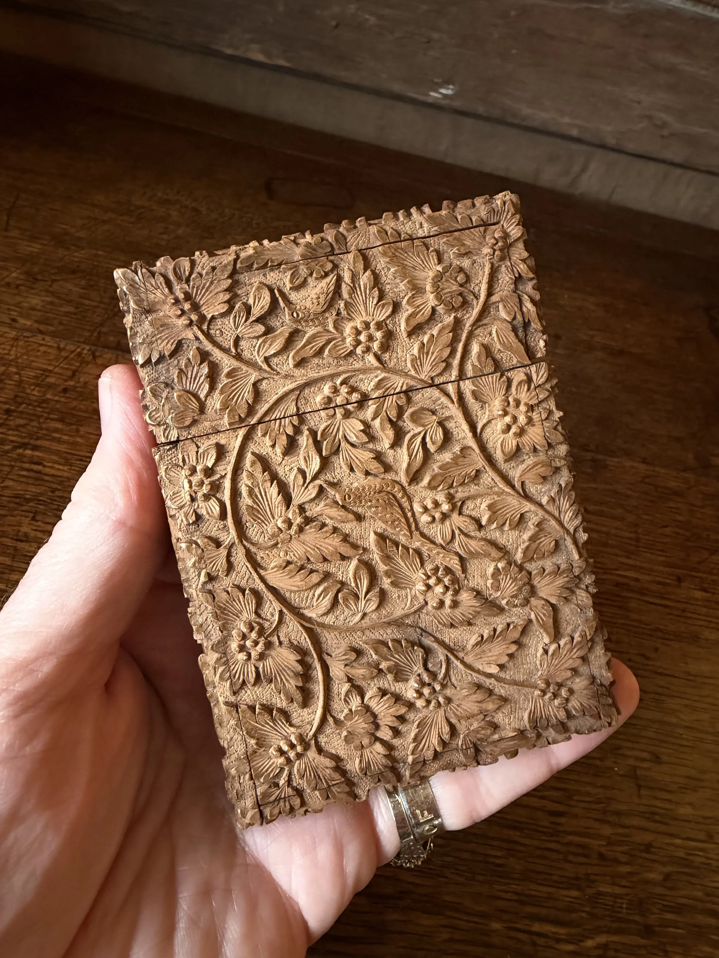 This is a picture of a fabulous late 19th century finely carved Anglo Indian wooden card case.