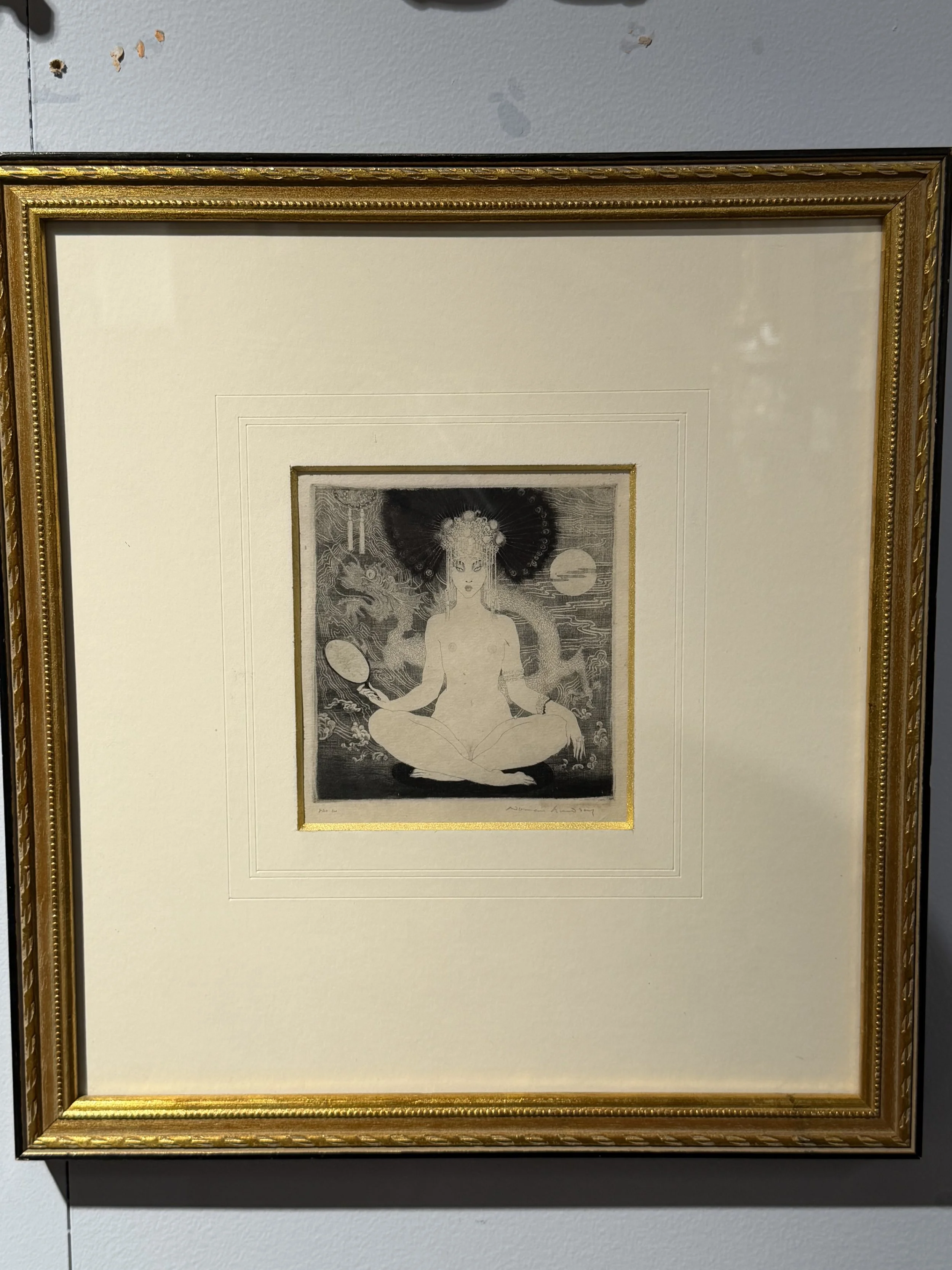 This is a picture of a rare etching by Norman Lindsay called “The Yellow Lady” numbered 14, from ‘Idylla, 1922’, a book of poems by Hugh McCrae.
