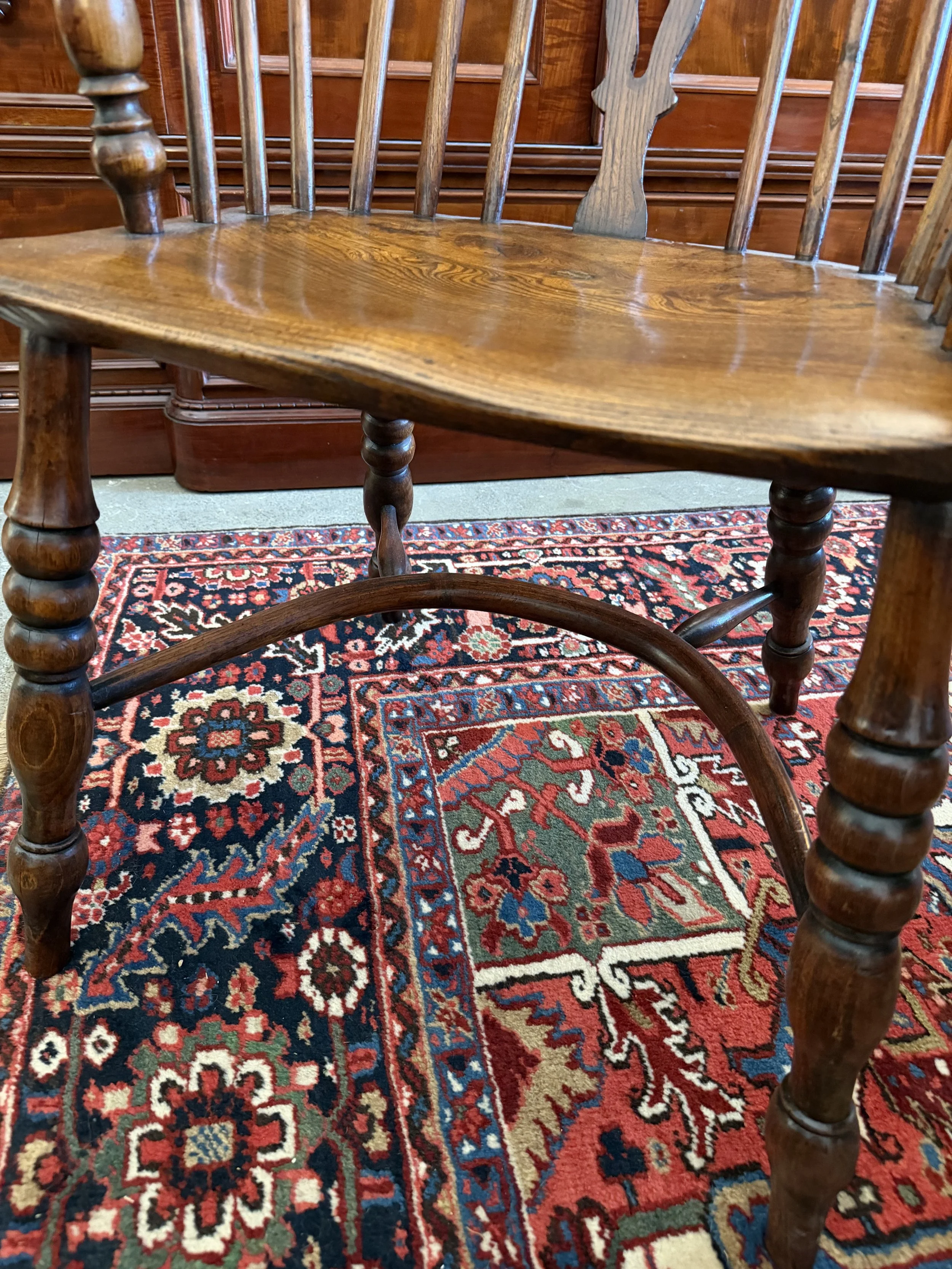 This is a picture of a beautiful mid 19th century high back Windsor armchair from Lincolnshire with a crinoline stretcher c1860.