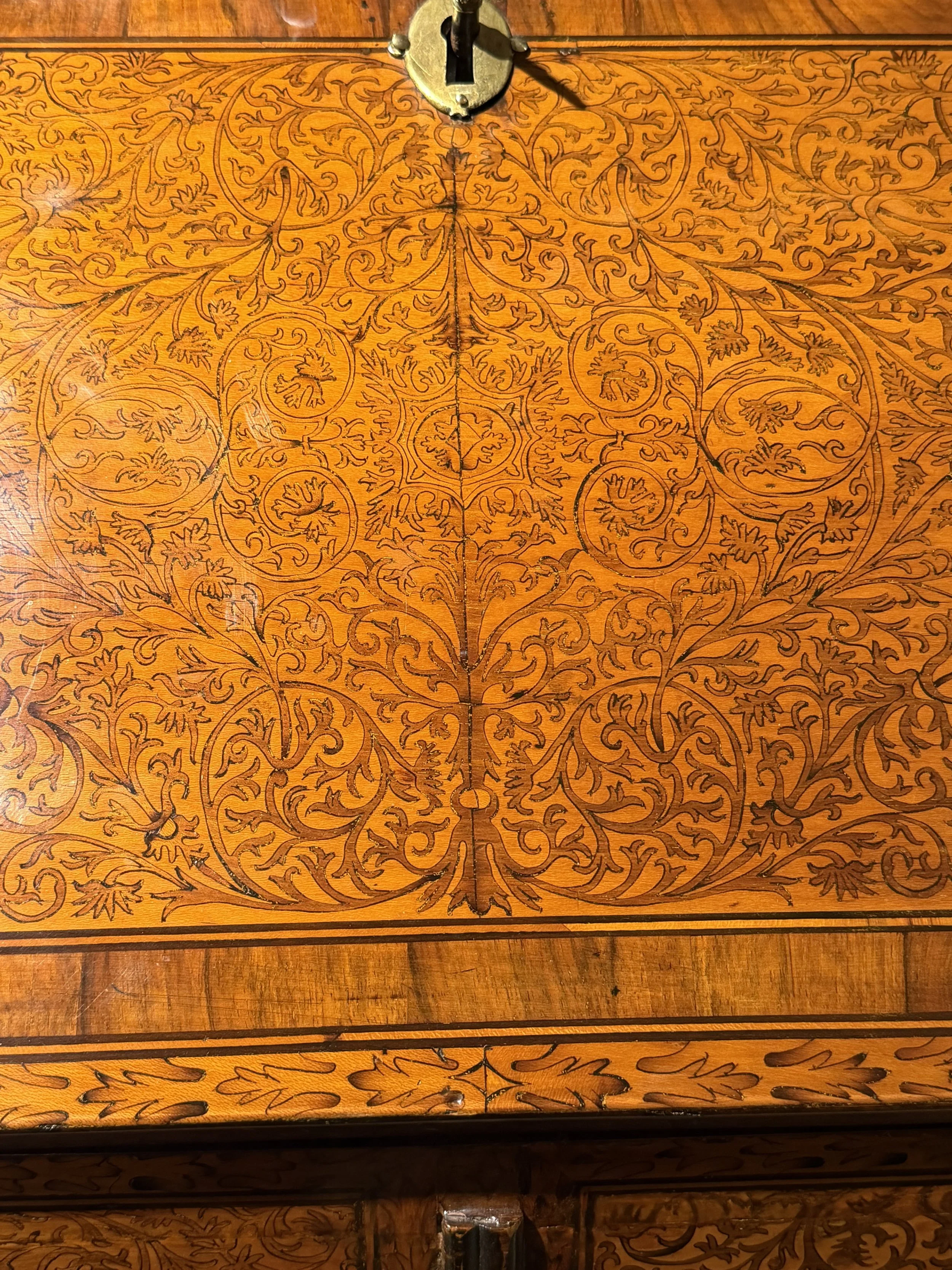 This is a picture of a very finely inlaid William & Mary period ’seaweed marquetry’ bureau c1700 attributed to Gerrit Jensen.