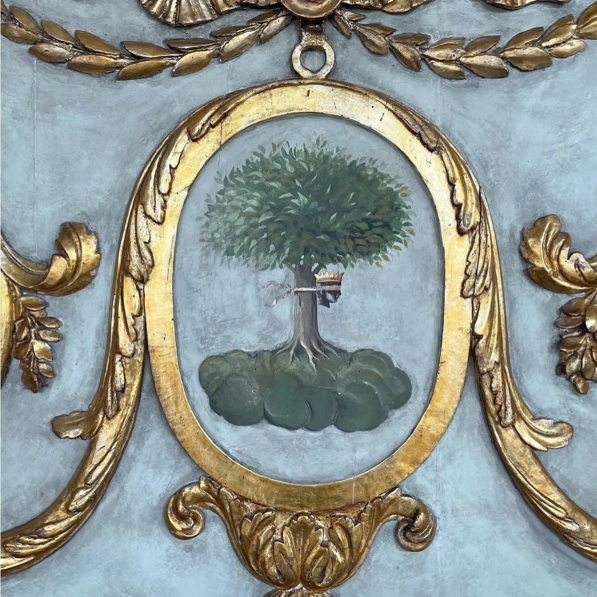 This is a picture of an antique decorative Italian gilt wood & polychrome heraldic panel c1780.