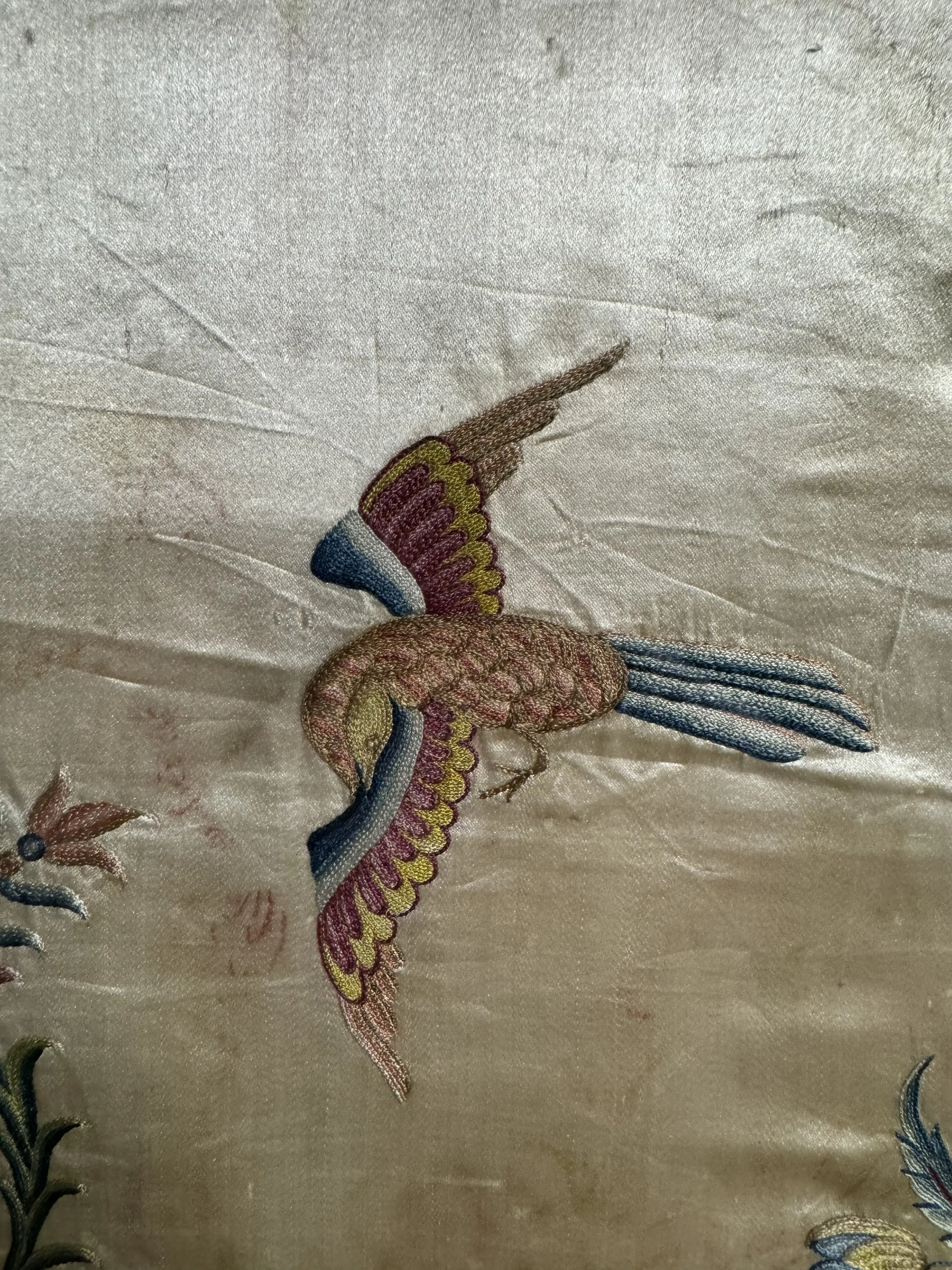 This is a picture of a very finely worked piece of framed late 18th century Chinese silk embroidery.