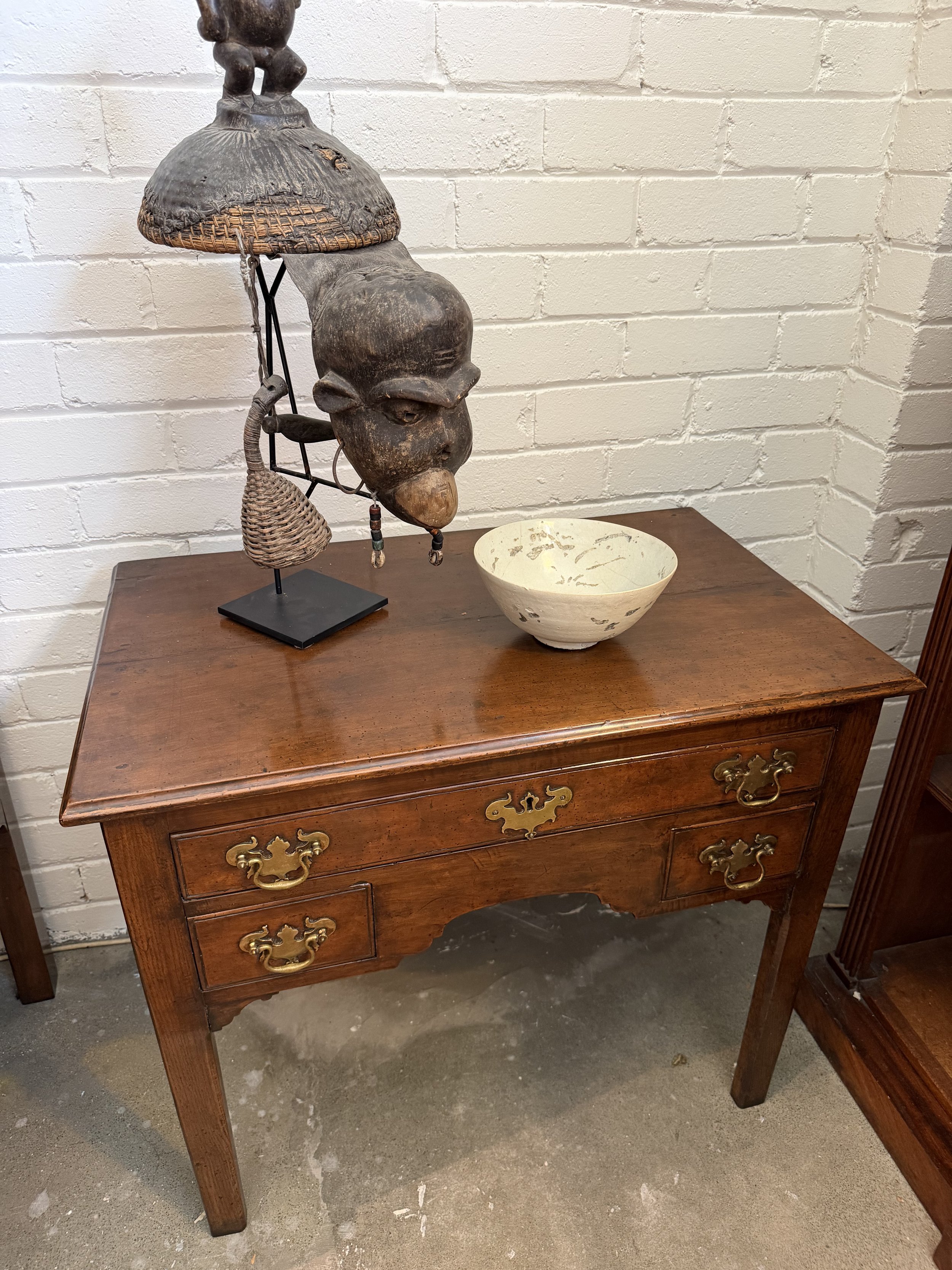 This is a picture of a lovely George III period fruitwood lowboy c1780.