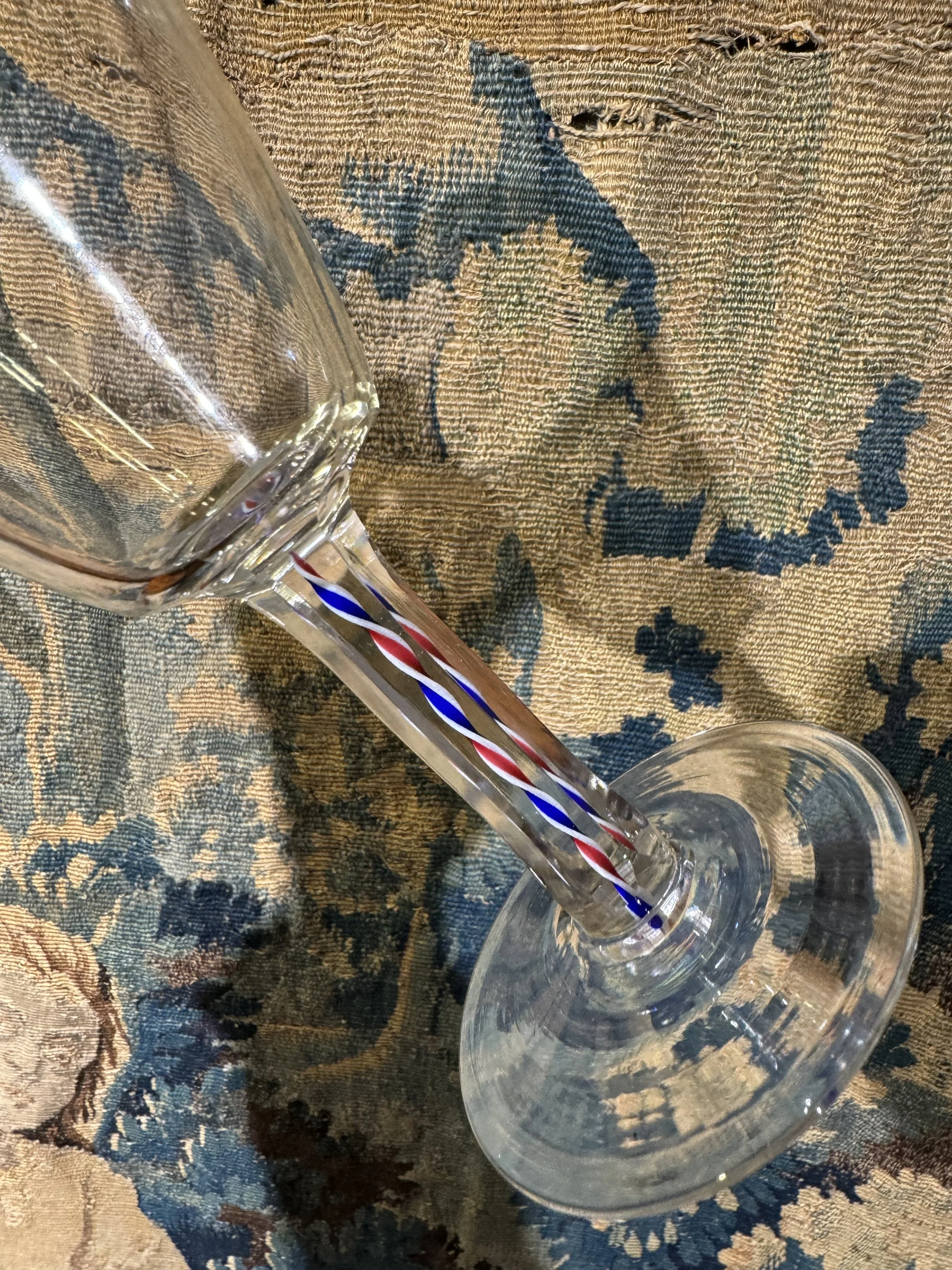 This is a picture of a fine and rare George VI Webb & Co engraved and enamel twist stem glass made for the 1937 coronation of King George VI, signed to the base.