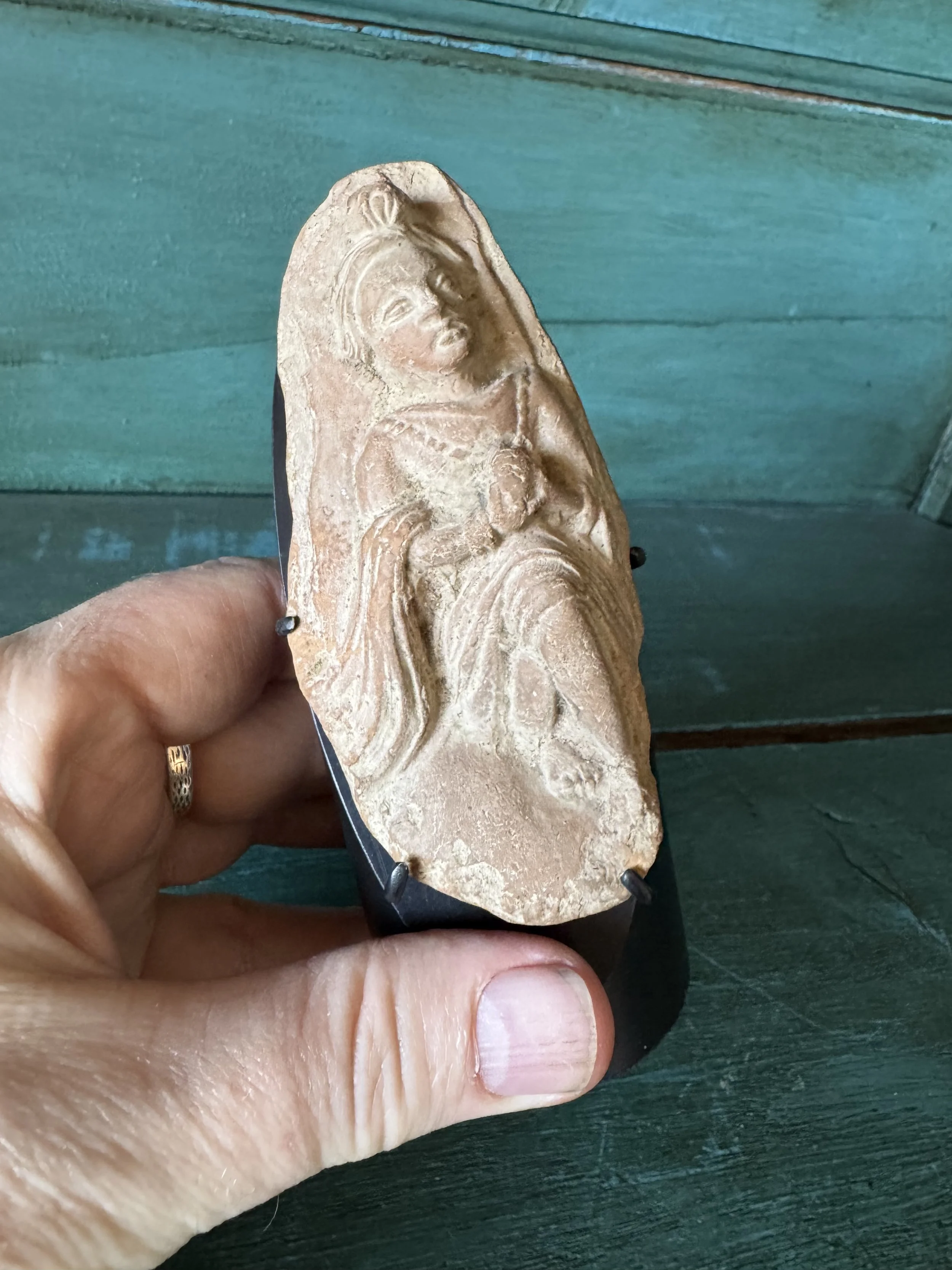 This is a picture of a superb Gandharan terracotta figure from the 1st century BCE.