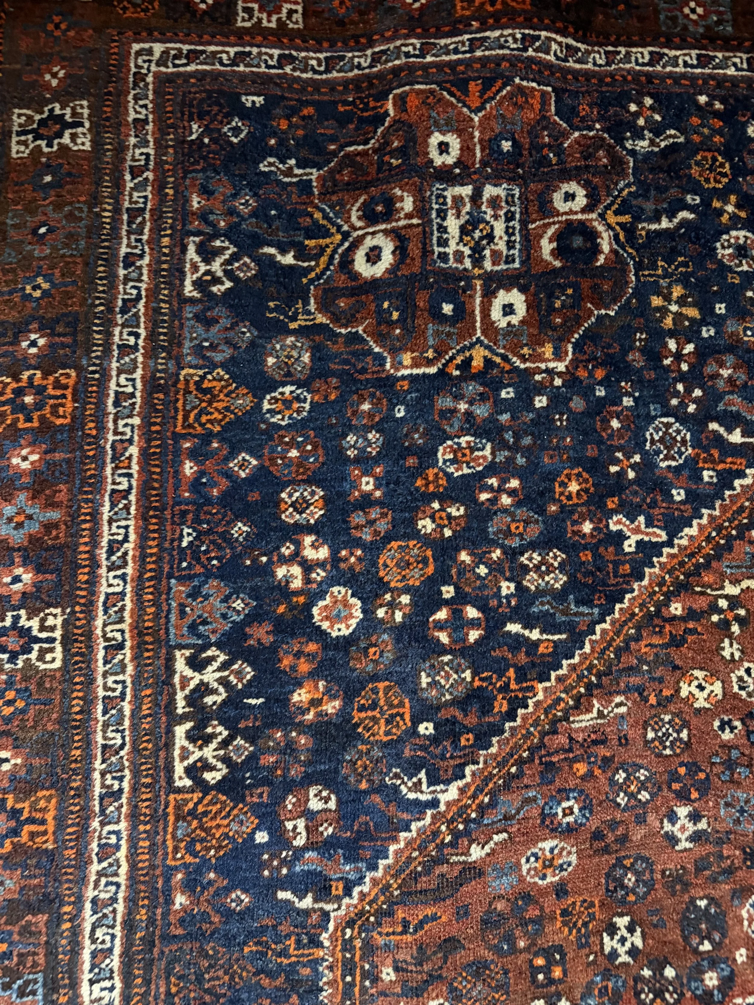 This si a picture of a superb wool on will hand knotted Persian Shiraz Mezit carpet c1920 with great colours and overall design.