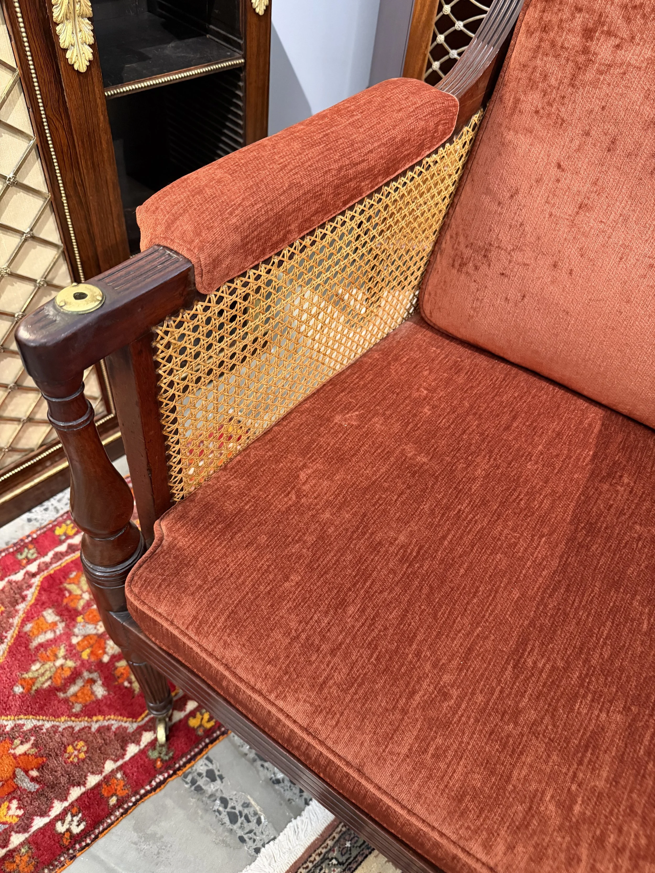 This is a picture of a very comfortable caned mahogany Georgian library armchair c1800.