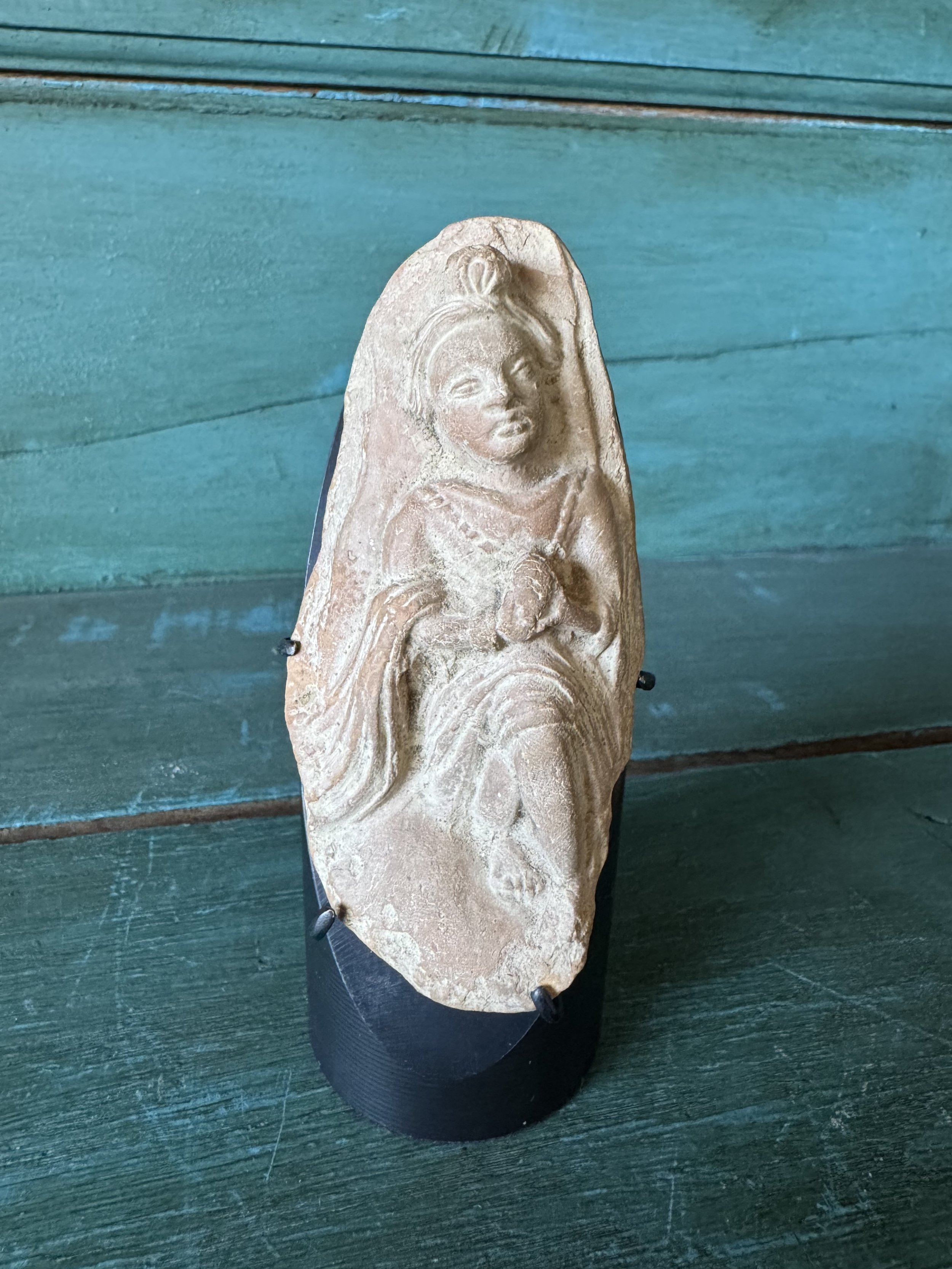 This is a picture of a superb Gandharan terracotta figure from the 1st century BCE.