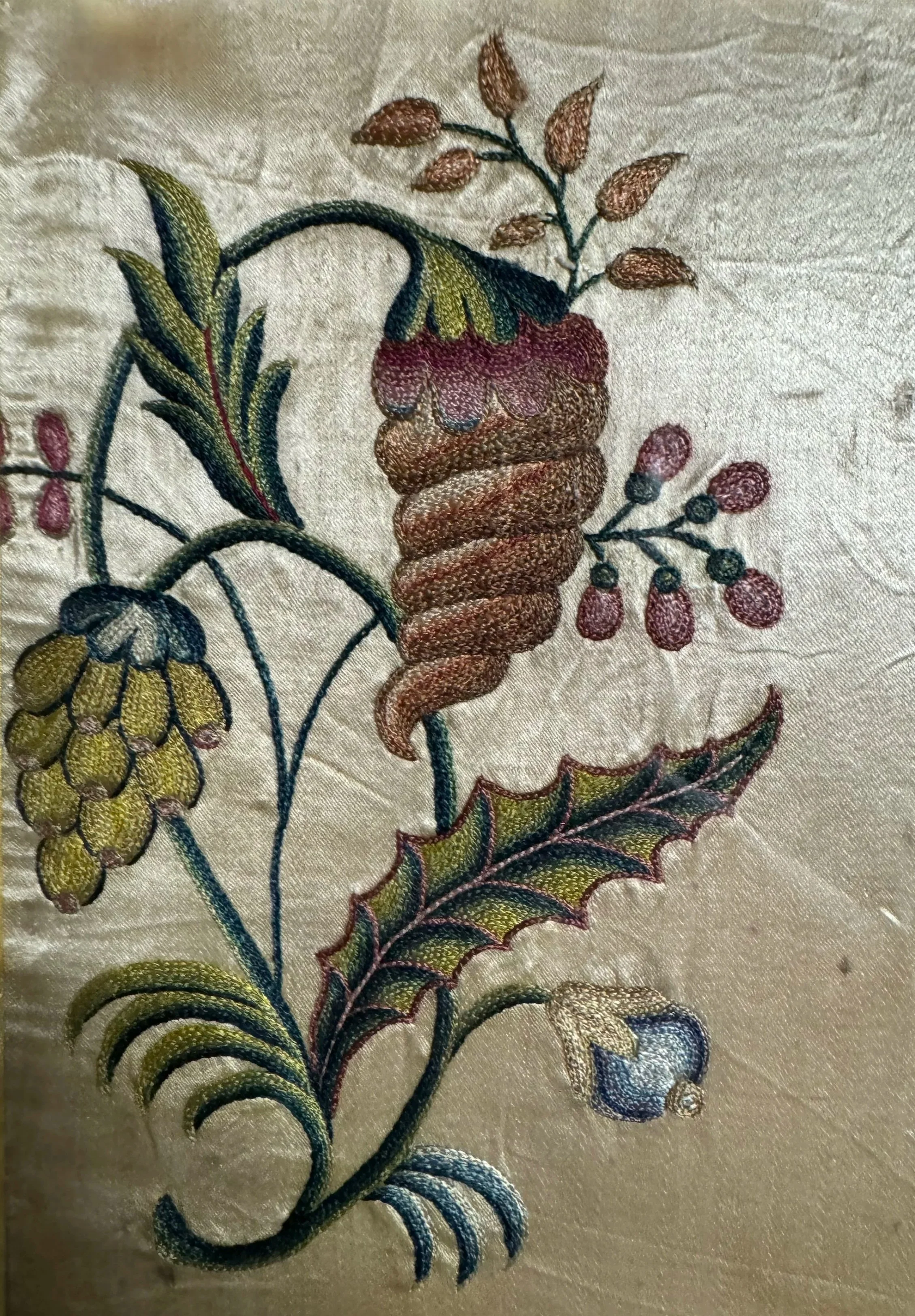 This is a picture of a very finely worked piece of framed late 18th century Chinese silk embroidery.