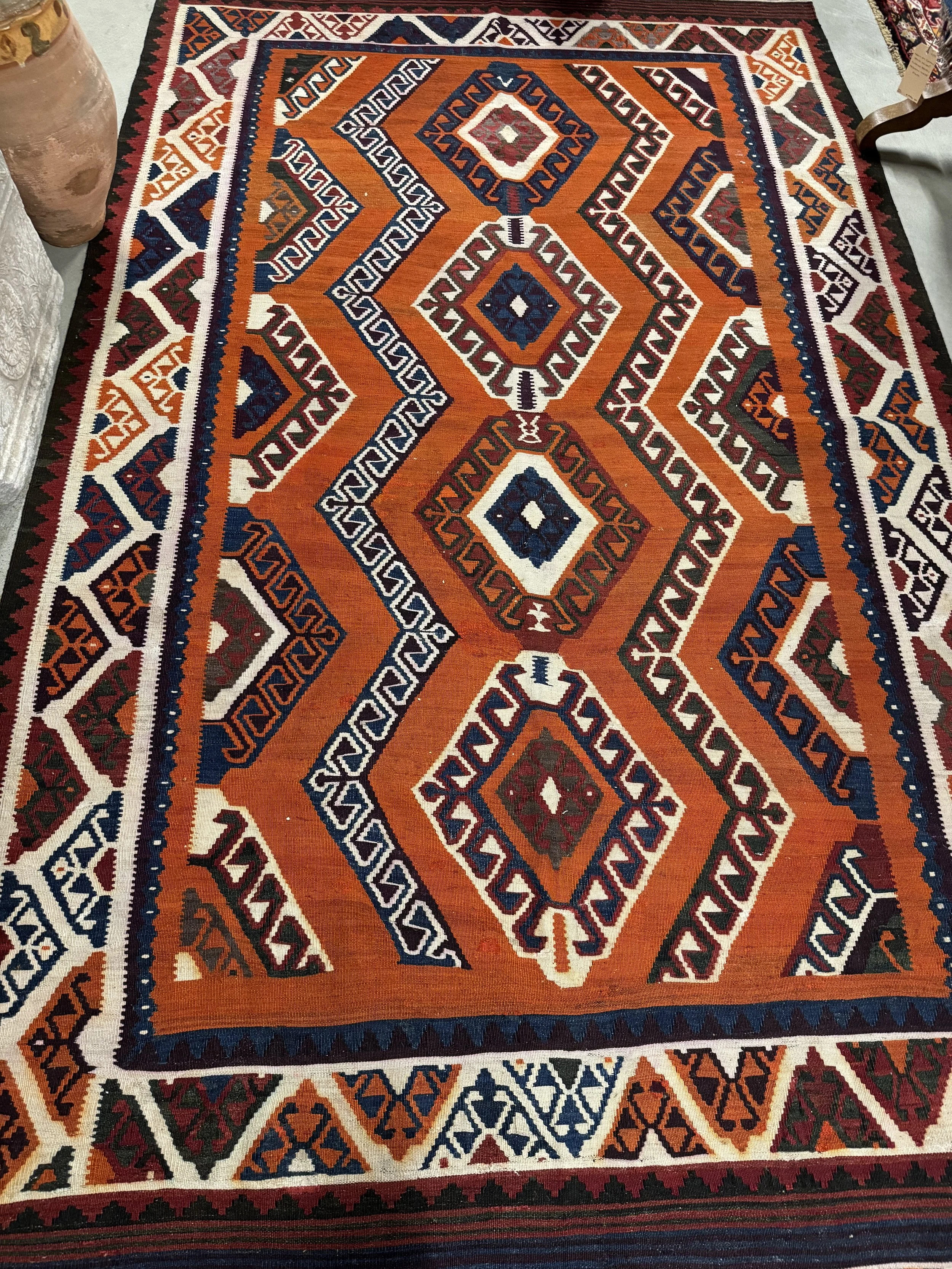 This is a picture of a hand woven wool on wool antique kilim from Shiraz c1900.