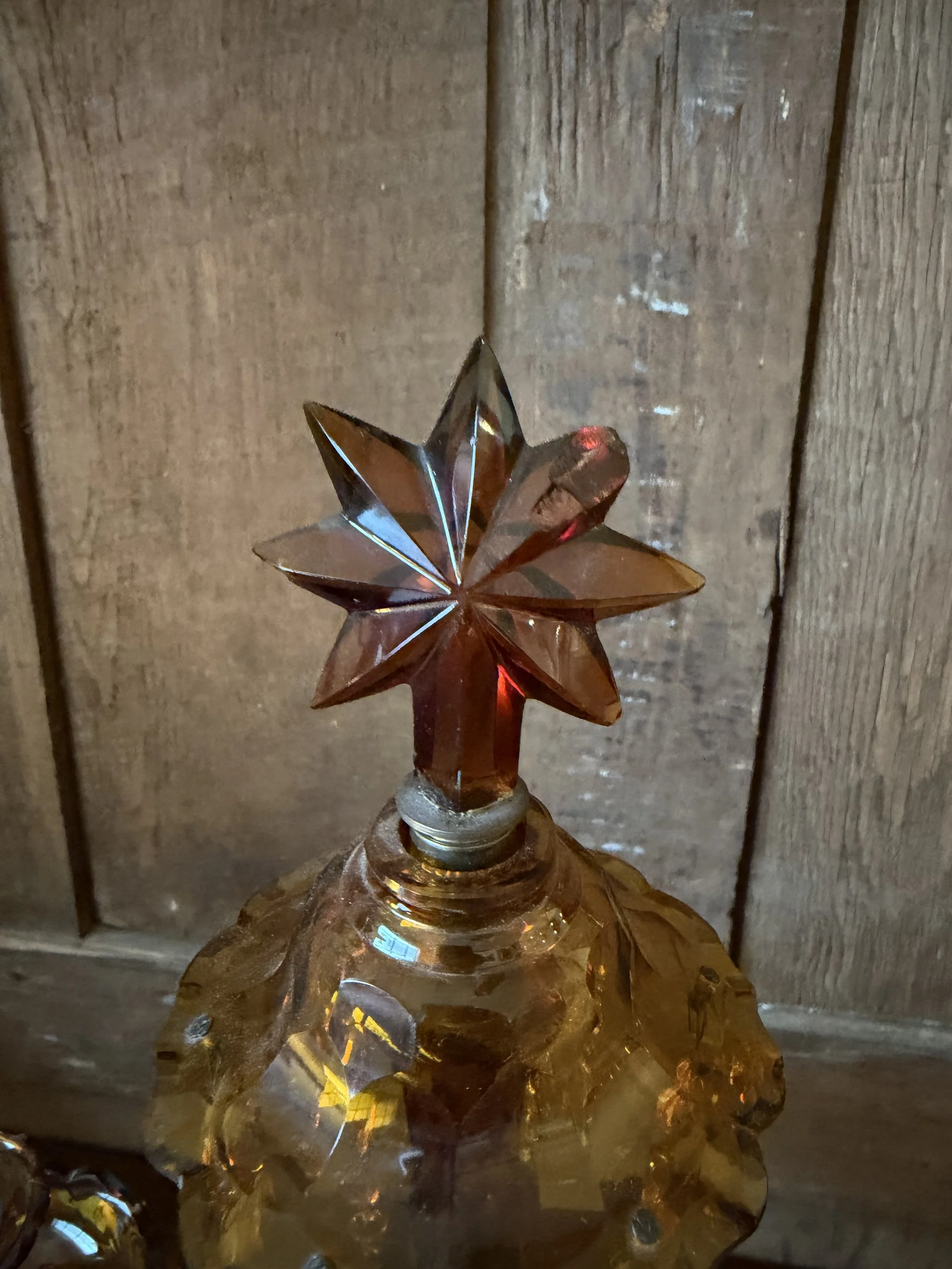 This is a picture of a fabulous pair of Edwardian Georgian revival girandoles in amber glass c1900.