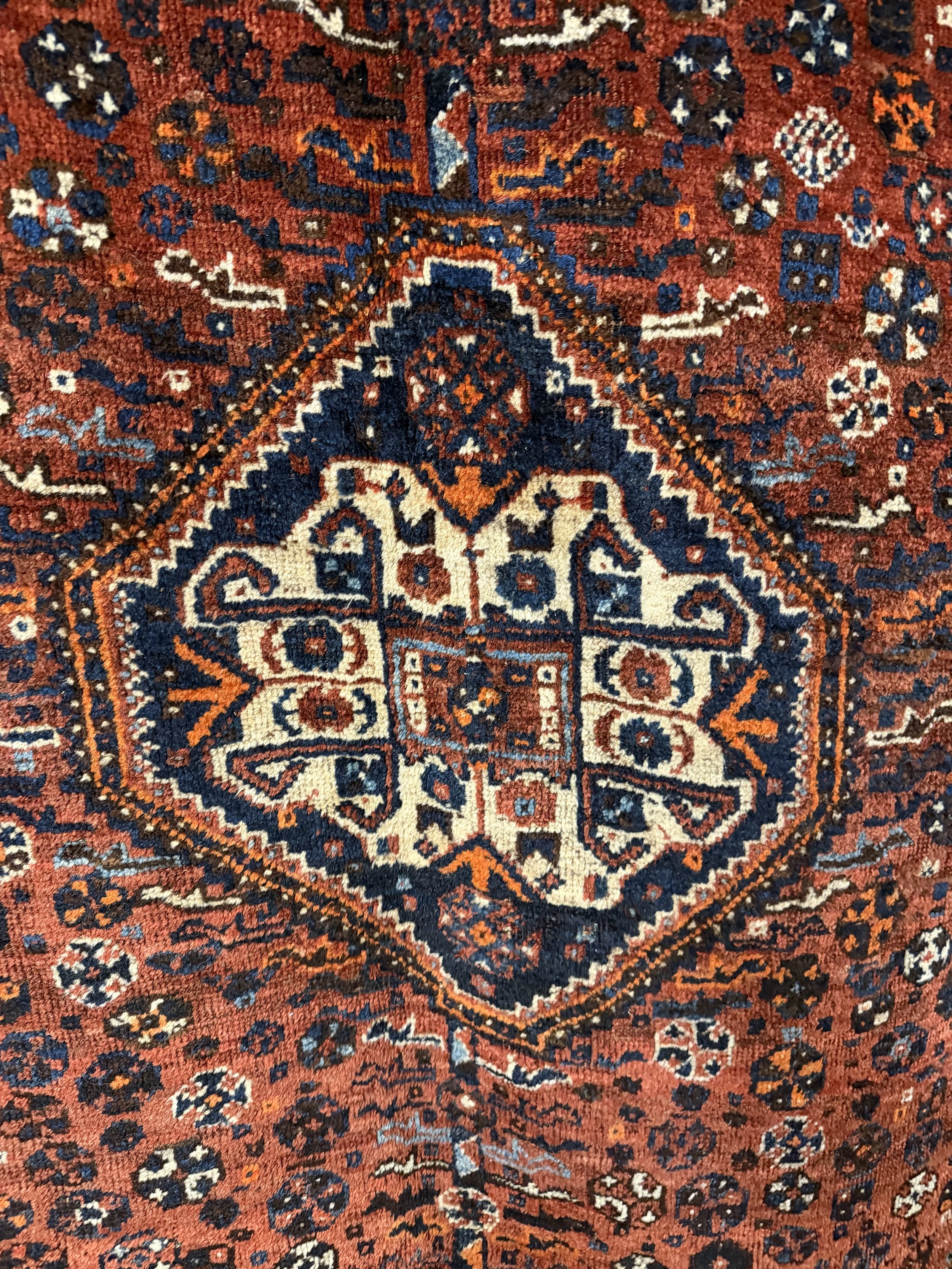 This si a picture of a superb wool on will hand knotted Persian Shiraz Mezit carpet c1920 with great colours and overall design.
