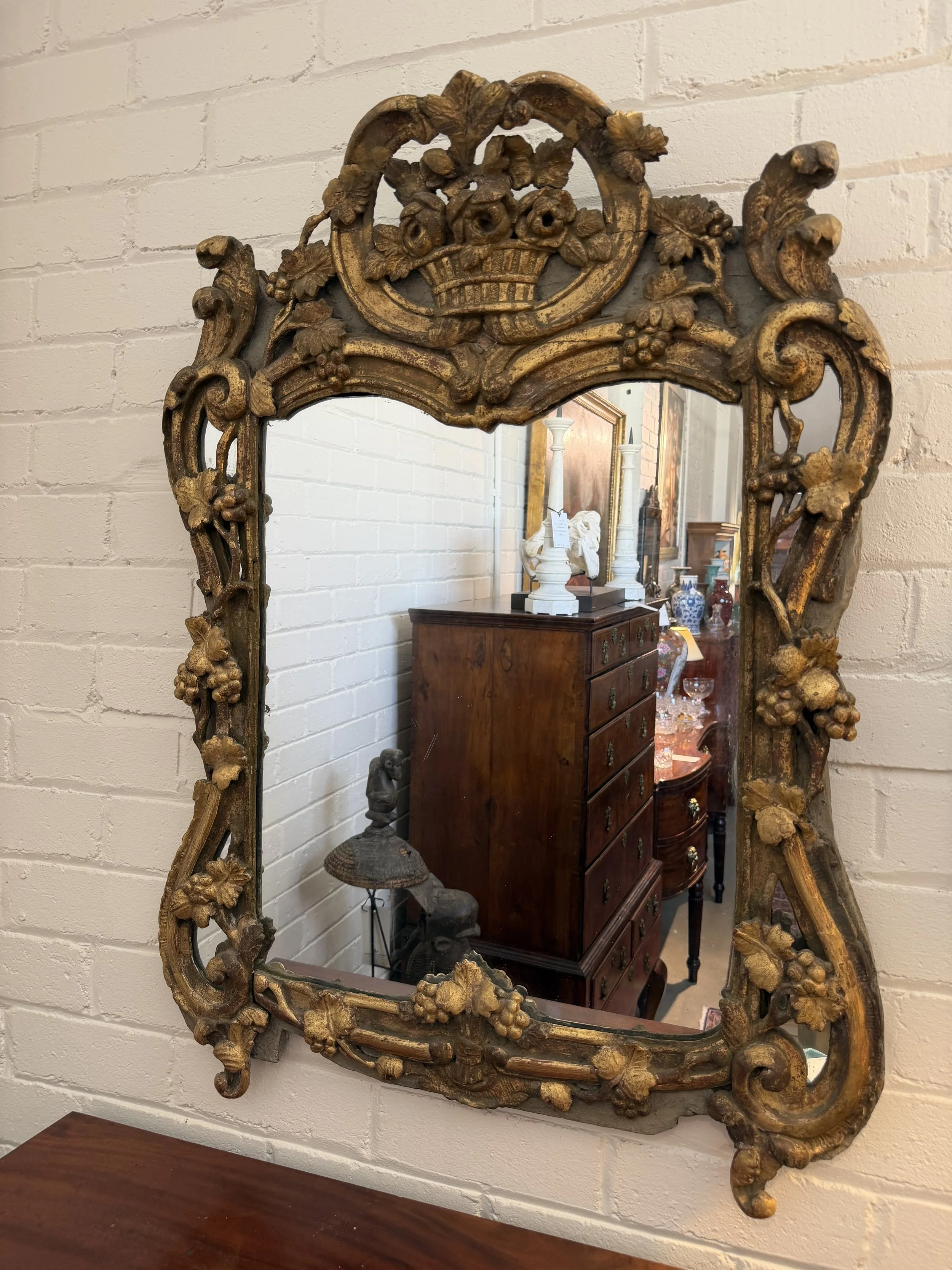 This is a picture of a very beautiful French Louis XV period carved and gilt wood mirror c1750.