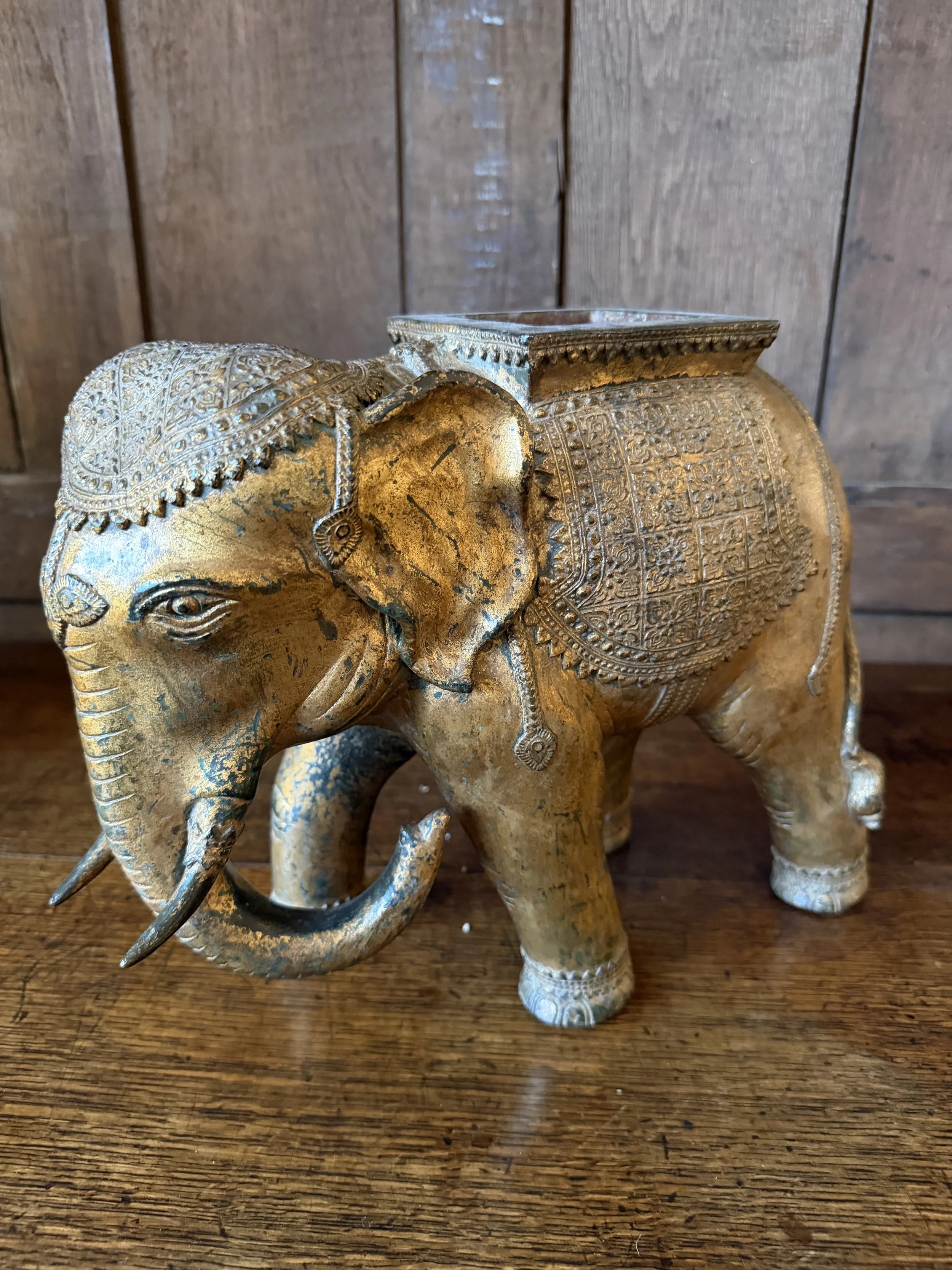 This is a picture of a fabulously decorative late 19th century gilt bronze elephant.