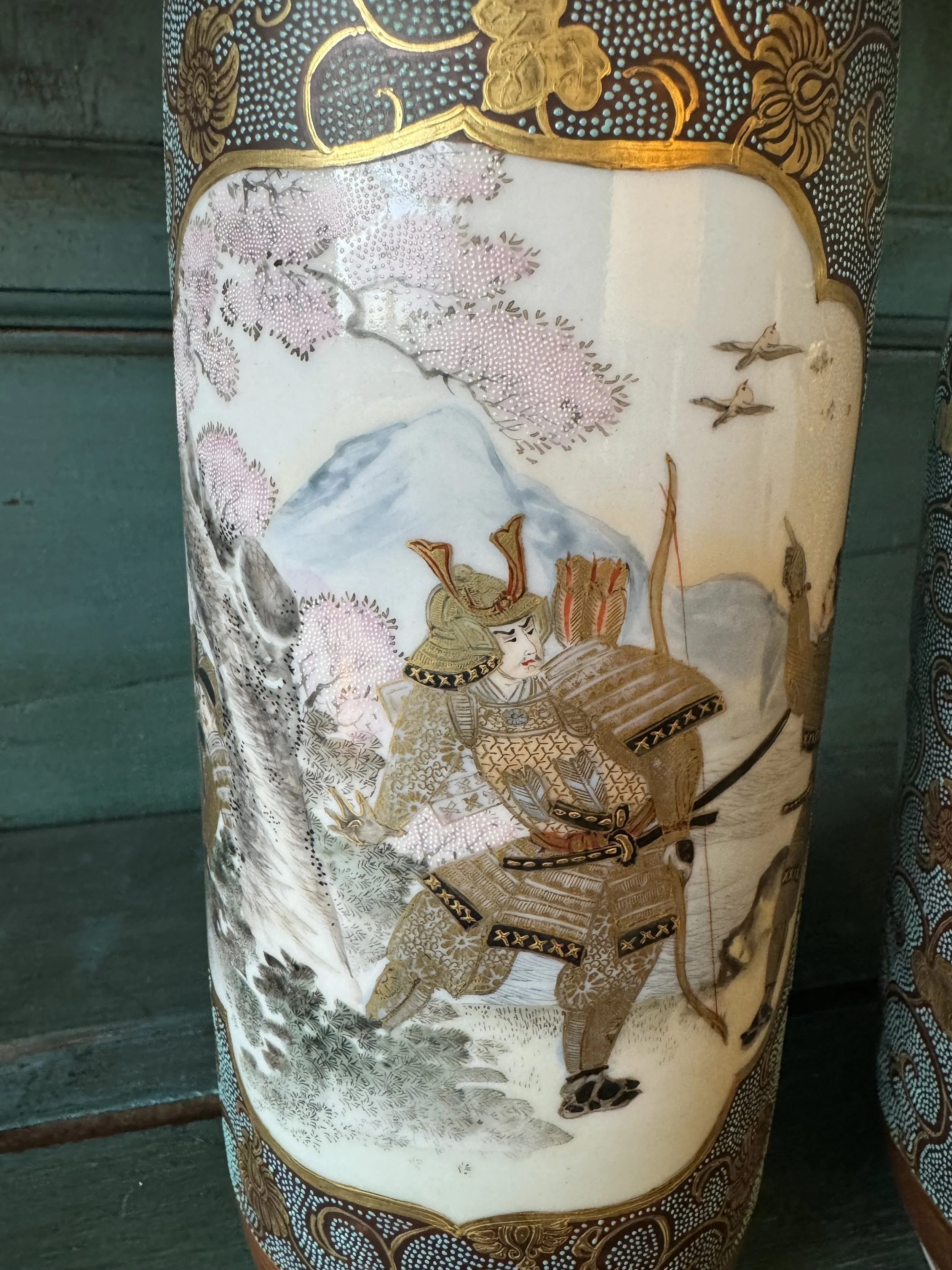 This is a picture of a pair of very finely painted Kutani Japanese porcelain vases c1880.