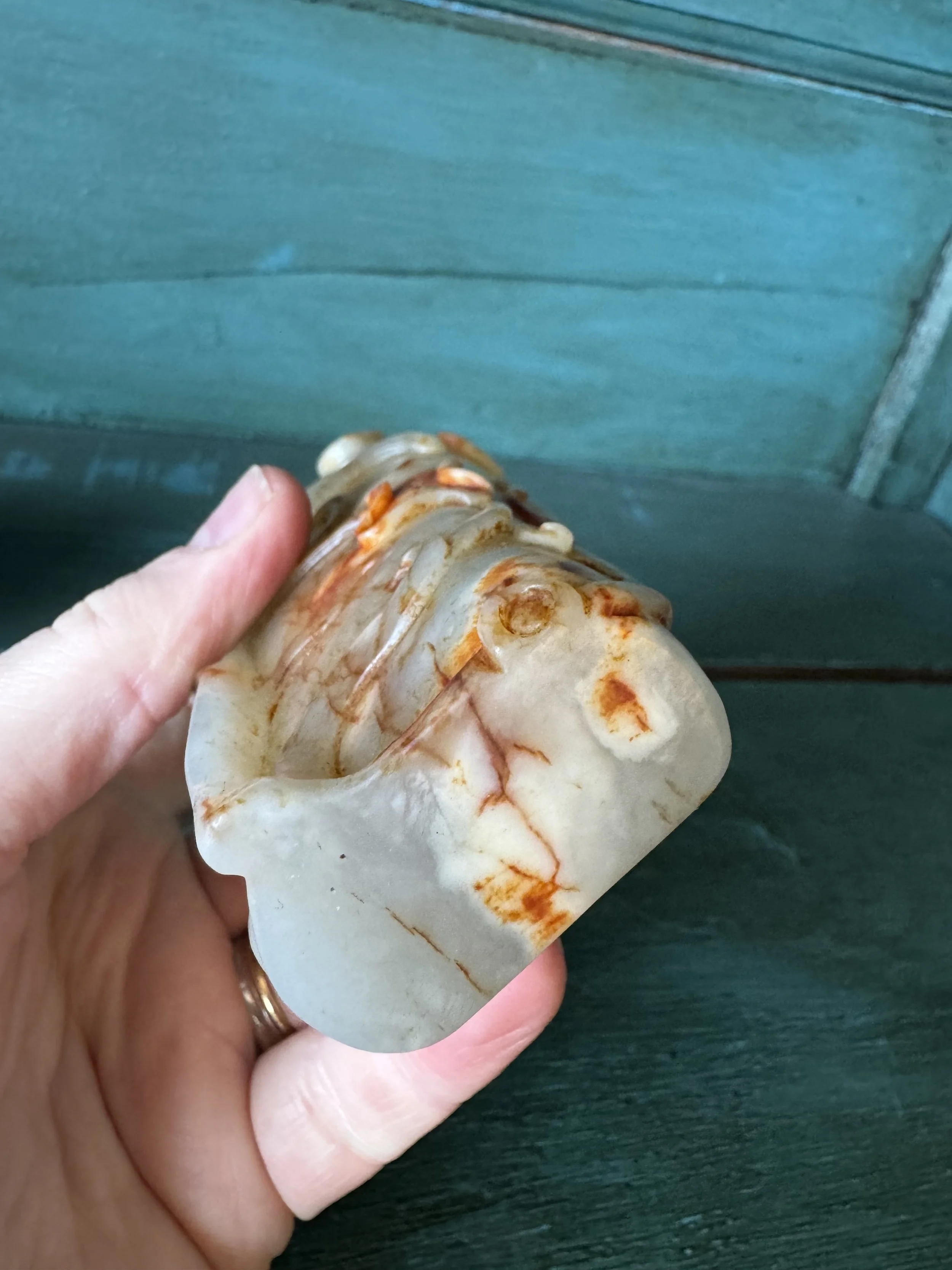 This is a picture of a very beautiful and finely carved antique 19th century Chinese jade brush washer.
