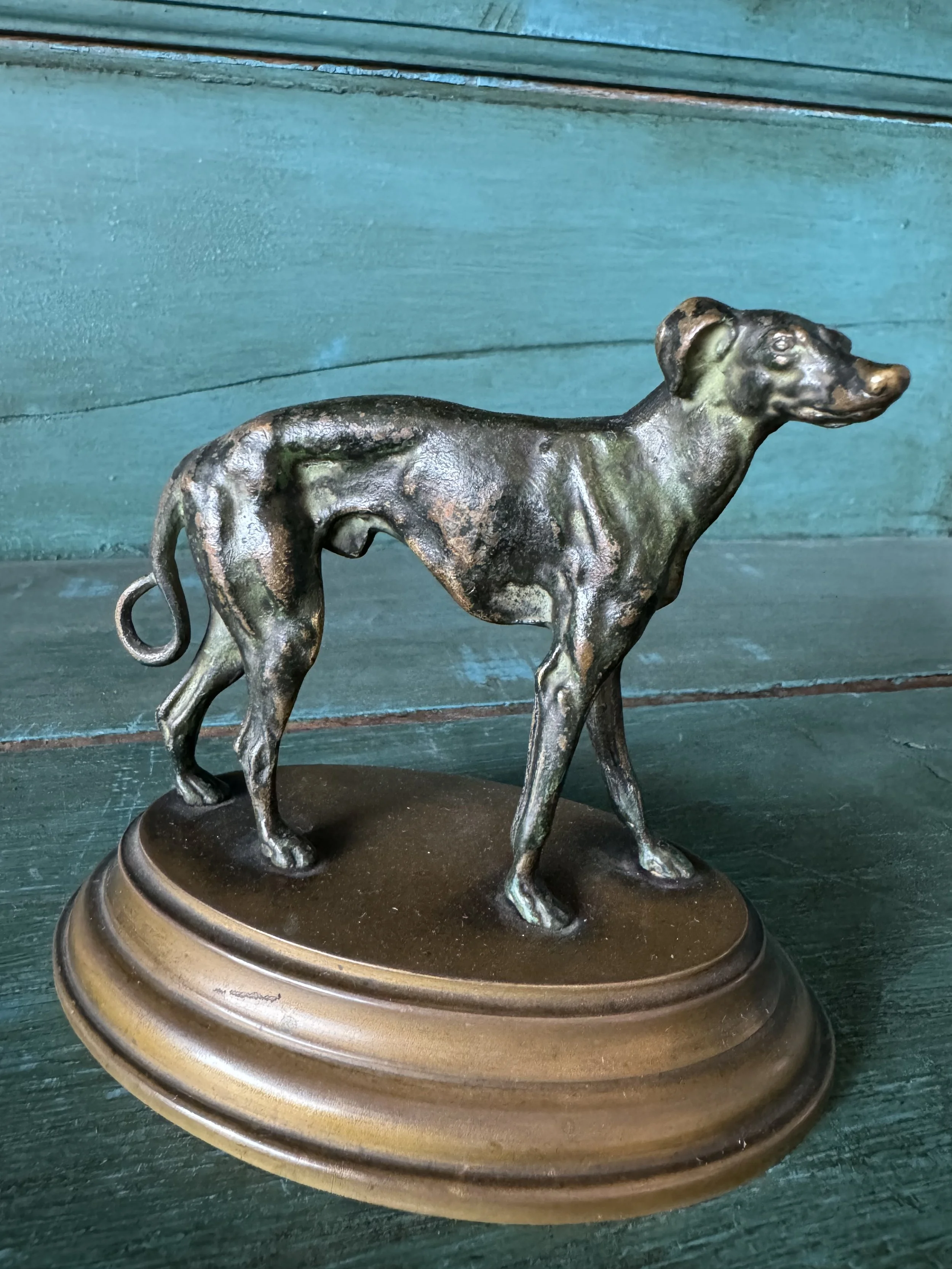 This is a picture of a very lovely antique French bronze animalier figure of a dog c1900.
