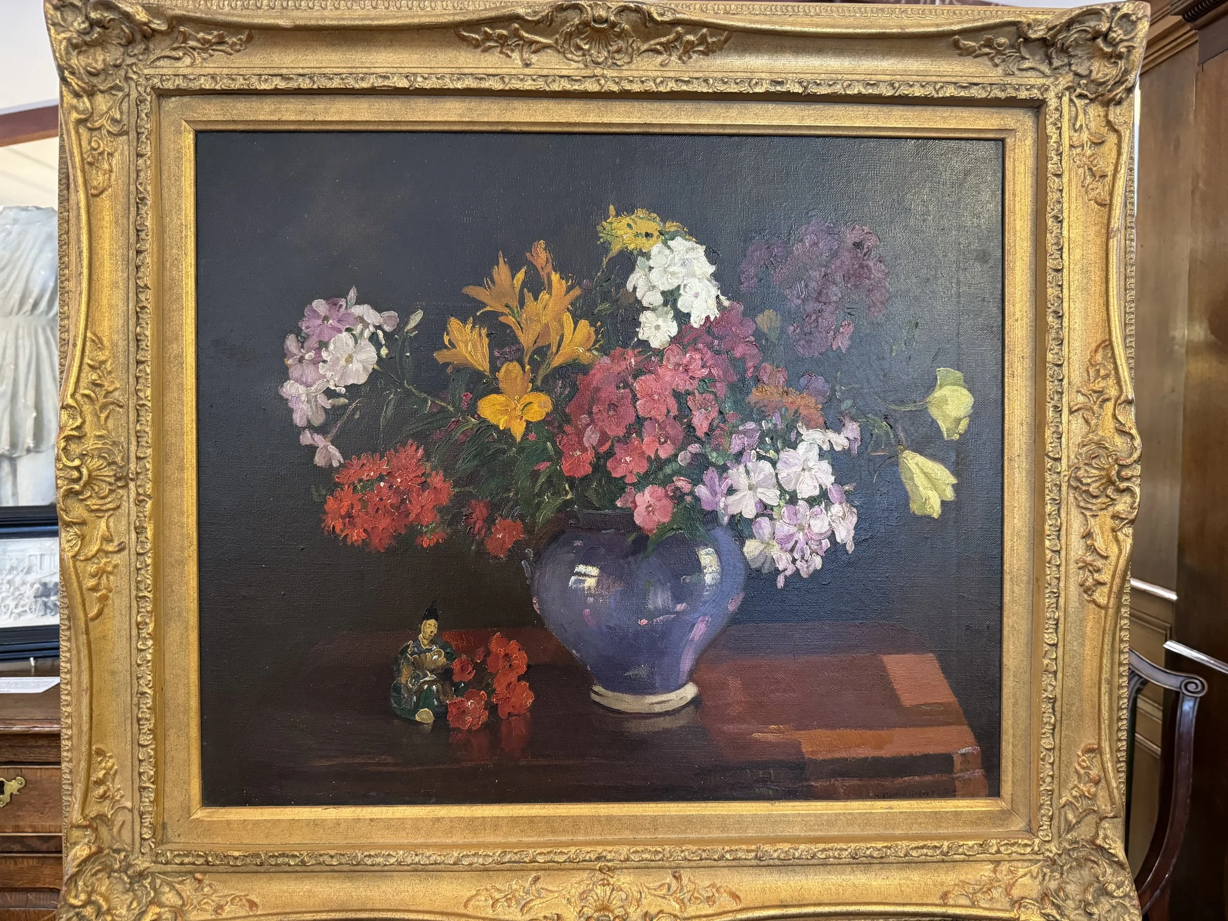 This is a picture of a floral still life oil on canvas by Herbert Davis Richter R.B.A., R.I., R.O.I., R.S.W. c1920.