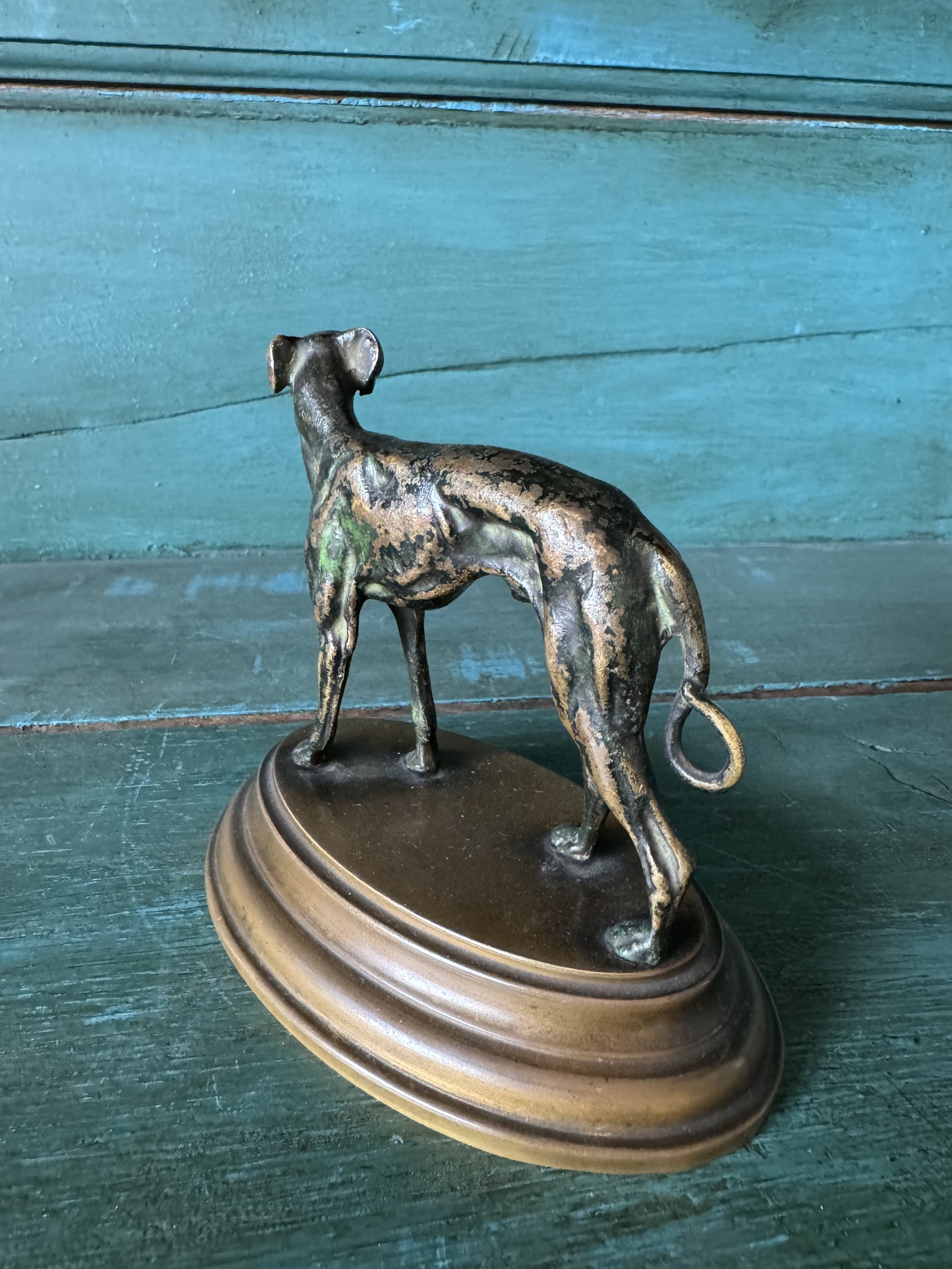 This is a picture of a very lovely antique French bronze animalier figure of a dog c1900.