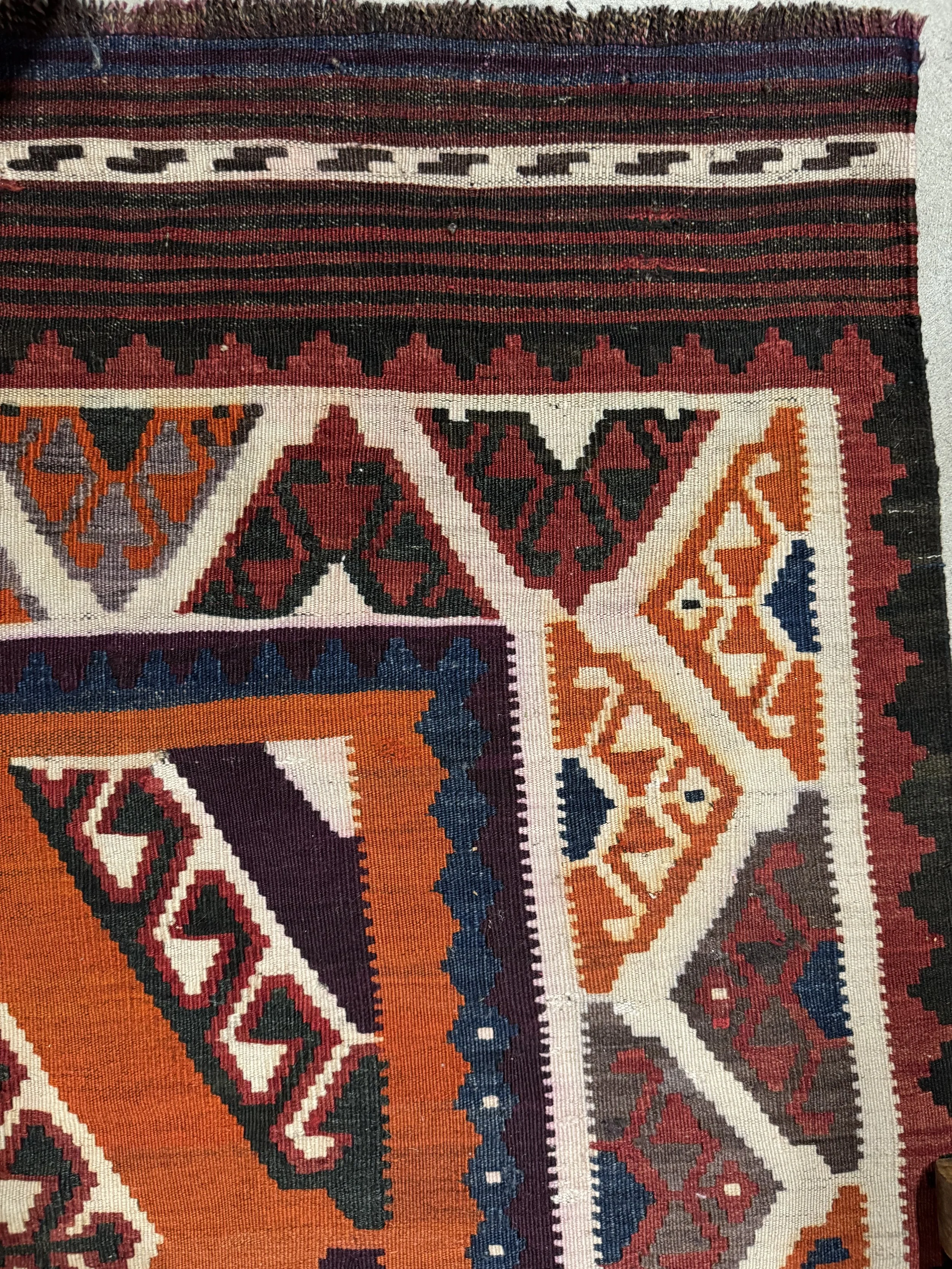 This is a picture of a hand woven wool on wool antique kilim from Shiraz c1900.
