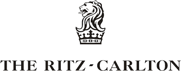 Logo of The Ritz-Carlton featuring a lion's head above a crown