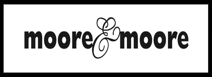 Logo with the words 'moore & moore' in black text, with a stylized ampersand between them.