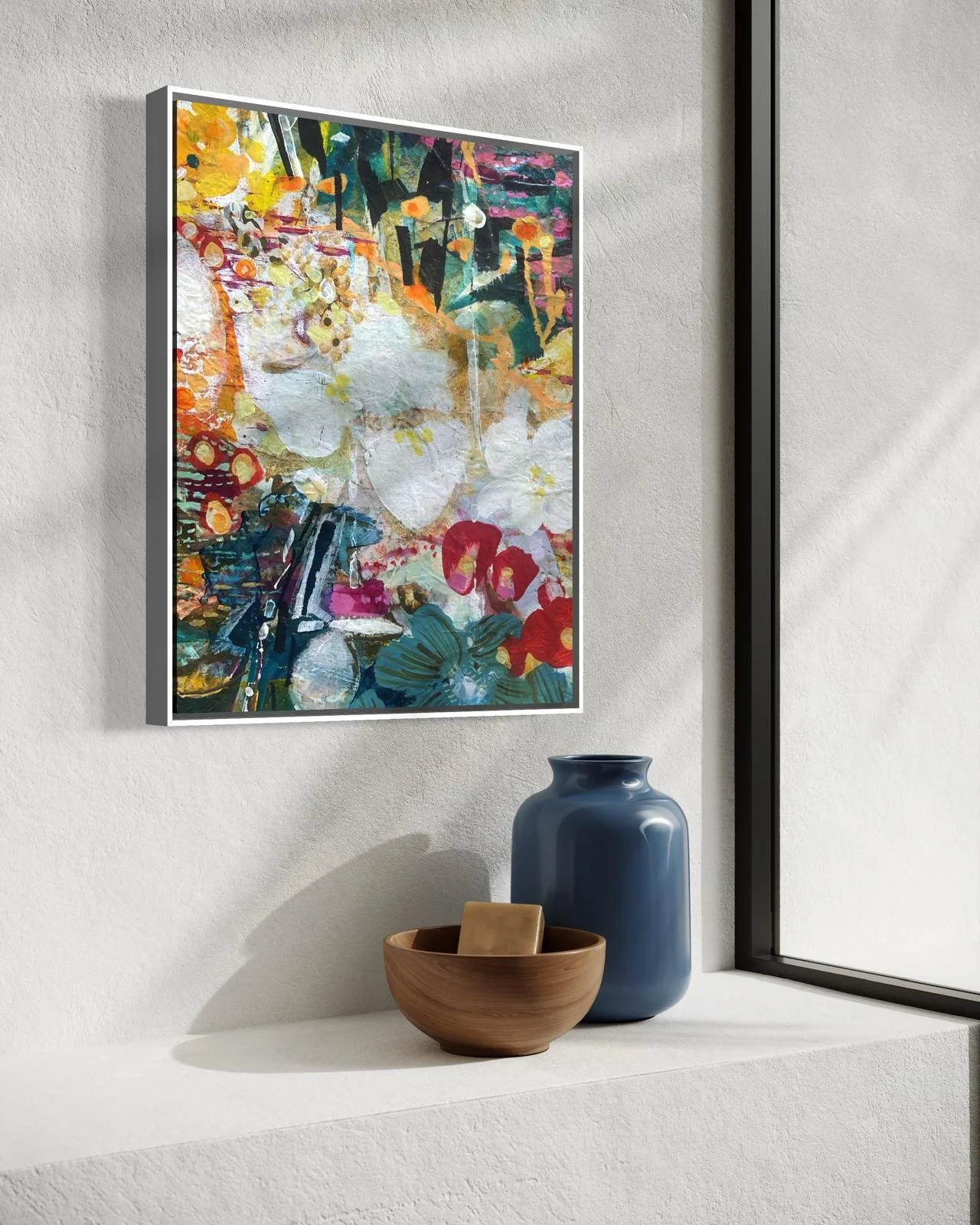 Undertow by Jo Morley framed and hung above a shelf, showing scale in a home setting