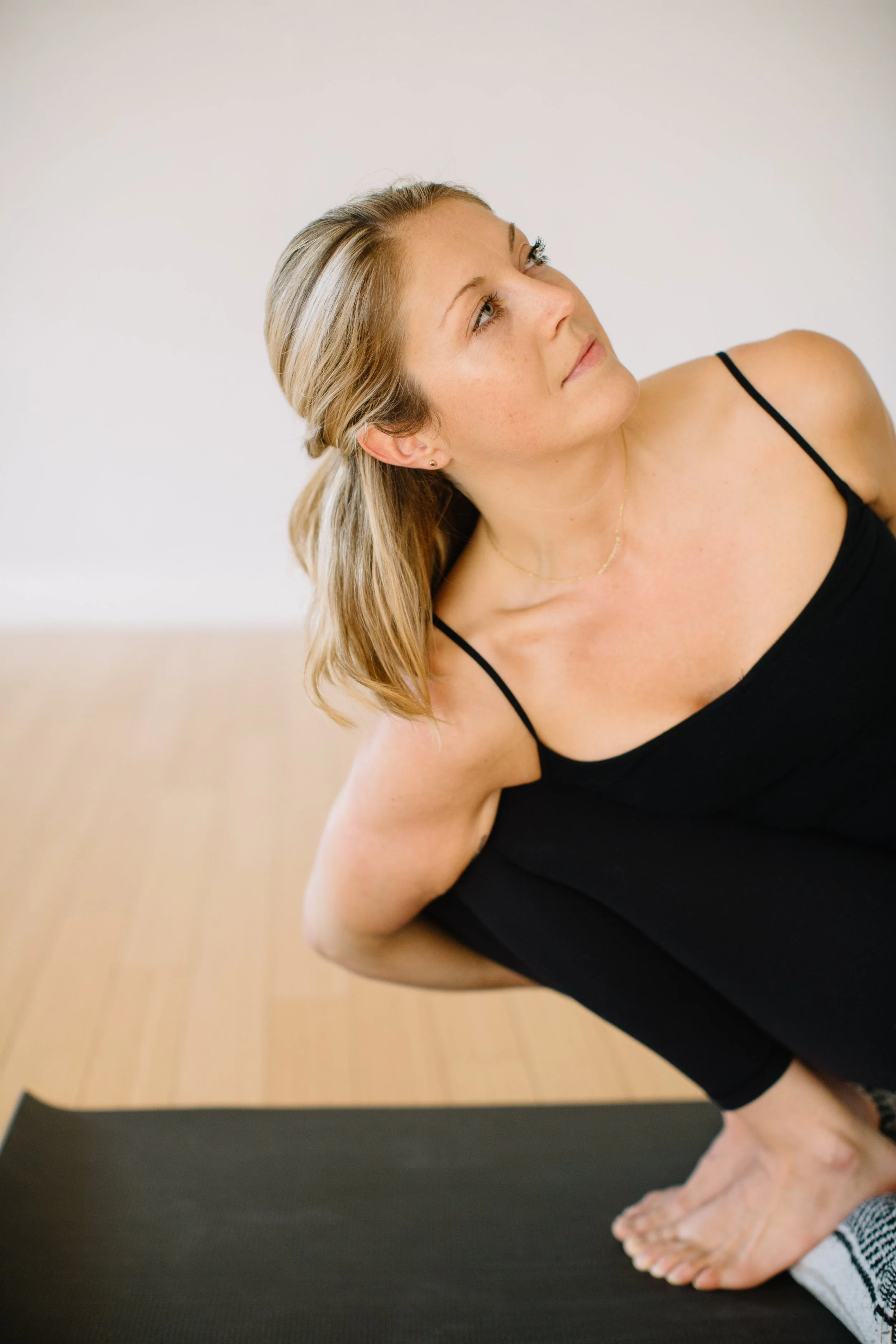 Ame Wren Boston Yoga Teacher Twist Squat