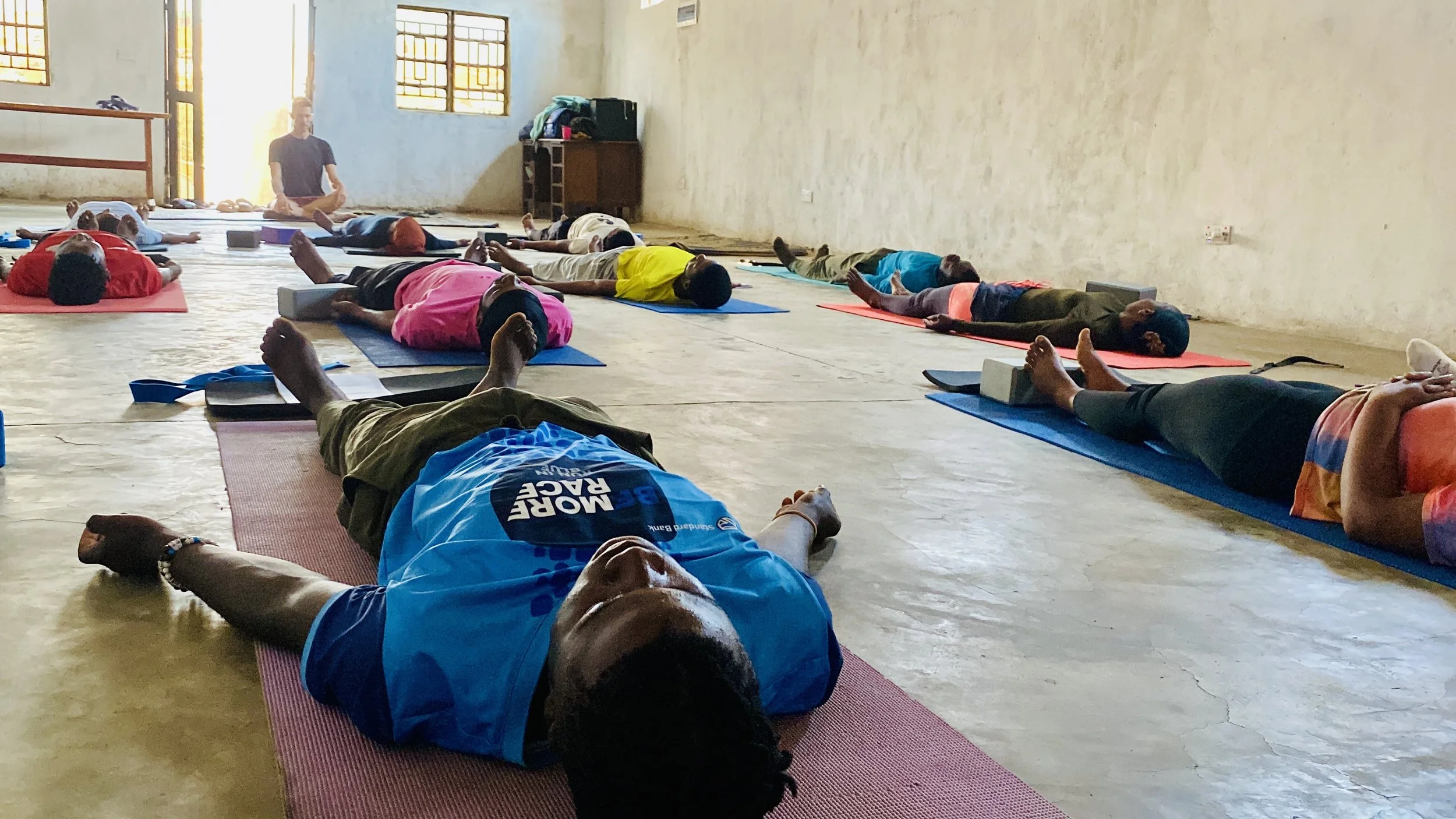 Dzaleka Refugee Yoga Savasana.jpeg
