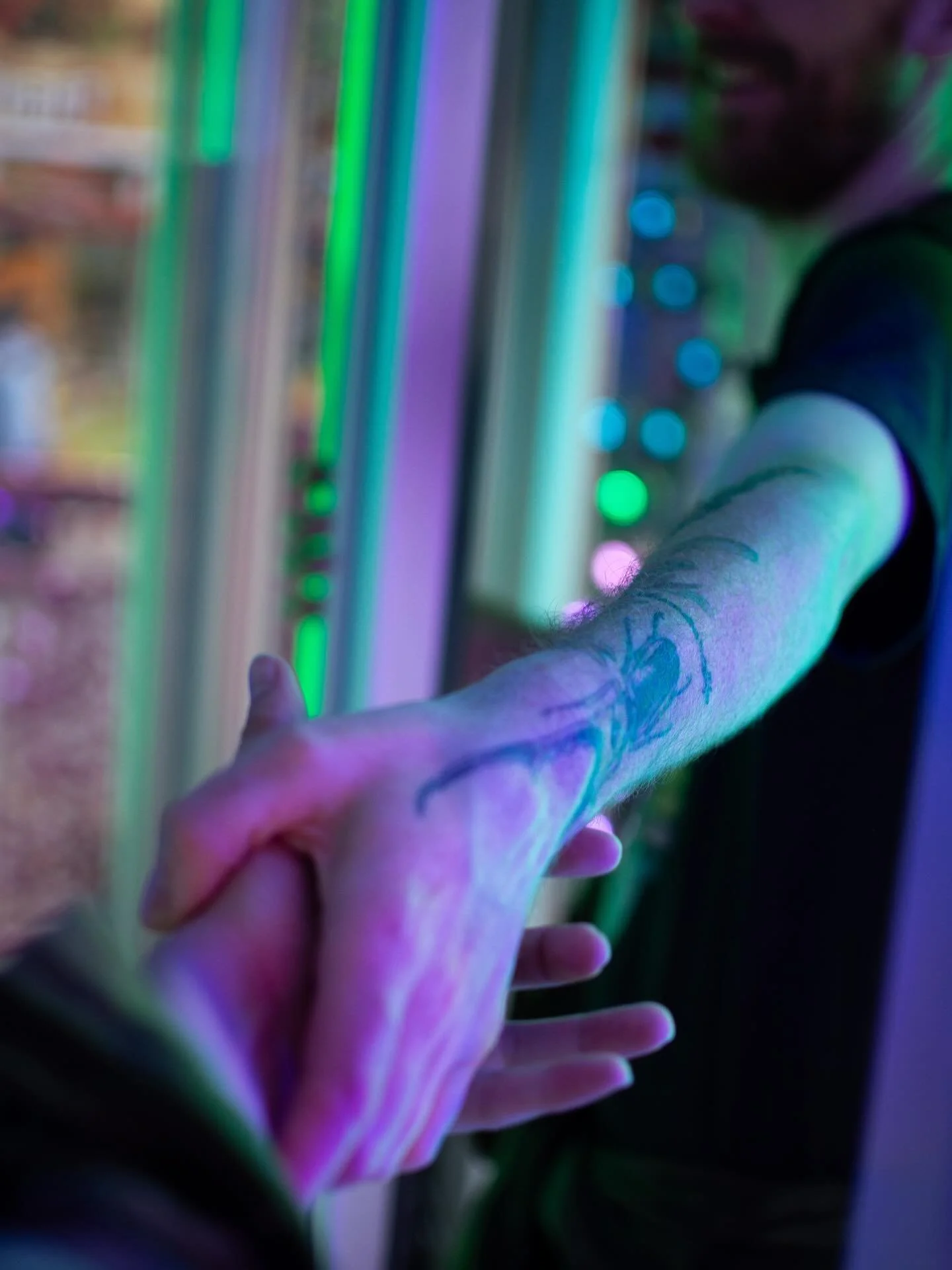 Finding each other in the funhouse 🫶
.
I snapped this photo of my beautiful partner @stark_raving_matt taking my hand amidst a rush of movement through the mirrored hallways of the funhouse at the Rose Festival last weekend. 
.
Such a simple moment,