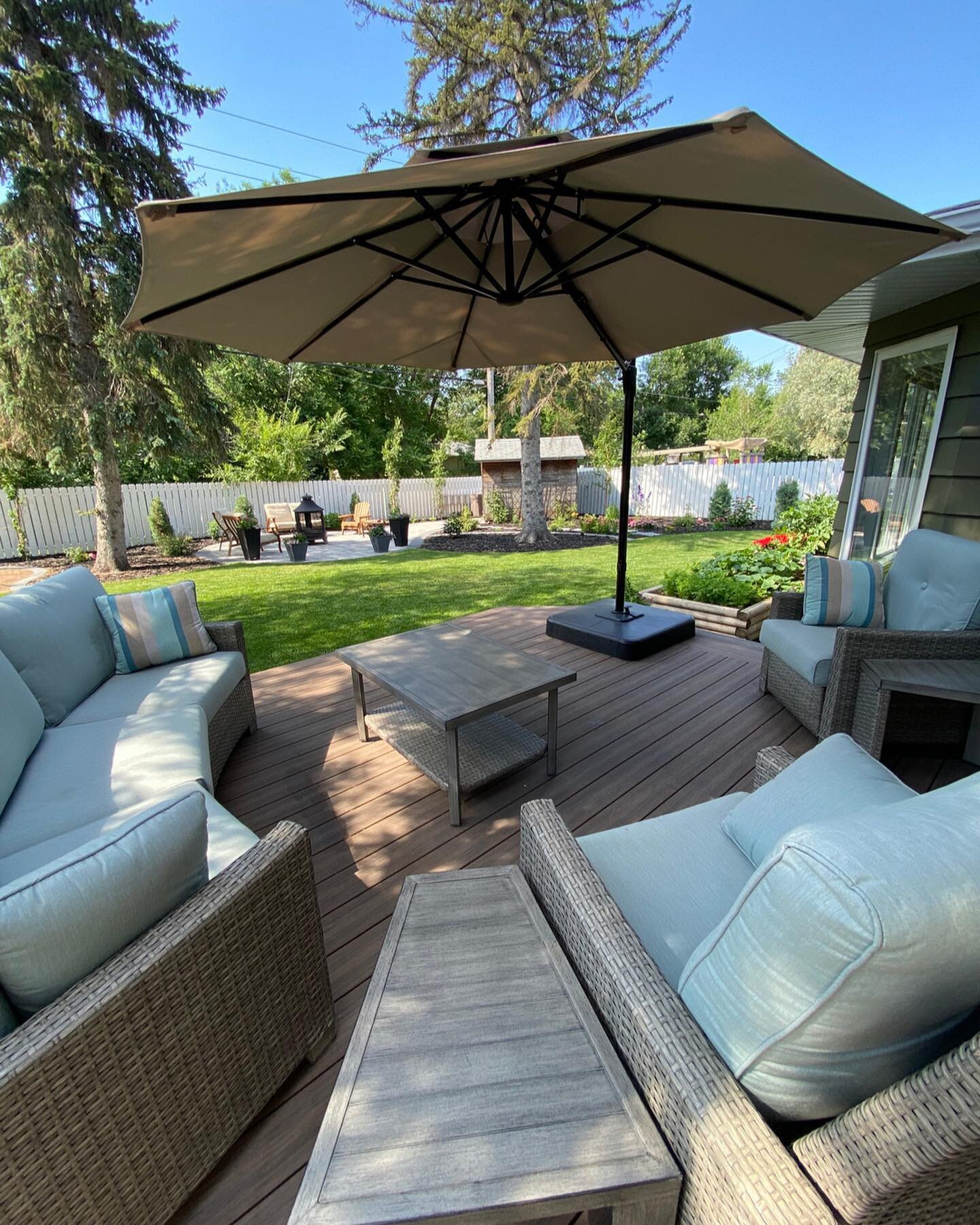 It's important to plan for all the views. What do you look out at from the window the other 8 months of the year that you aren't on your deck or patio? 
I love to plan for the yard to look amazing in the summer but let's consider the rest of the seas