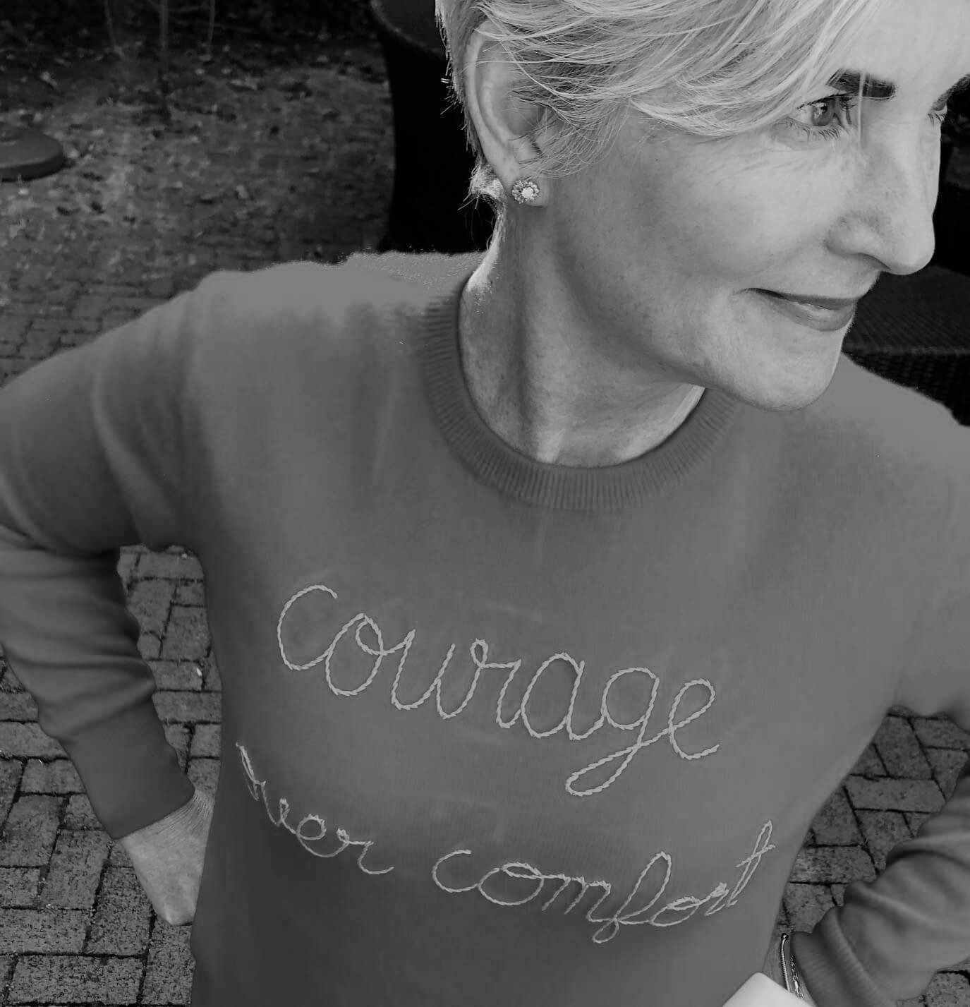 Christina Langdon - wears a shirt that says courage